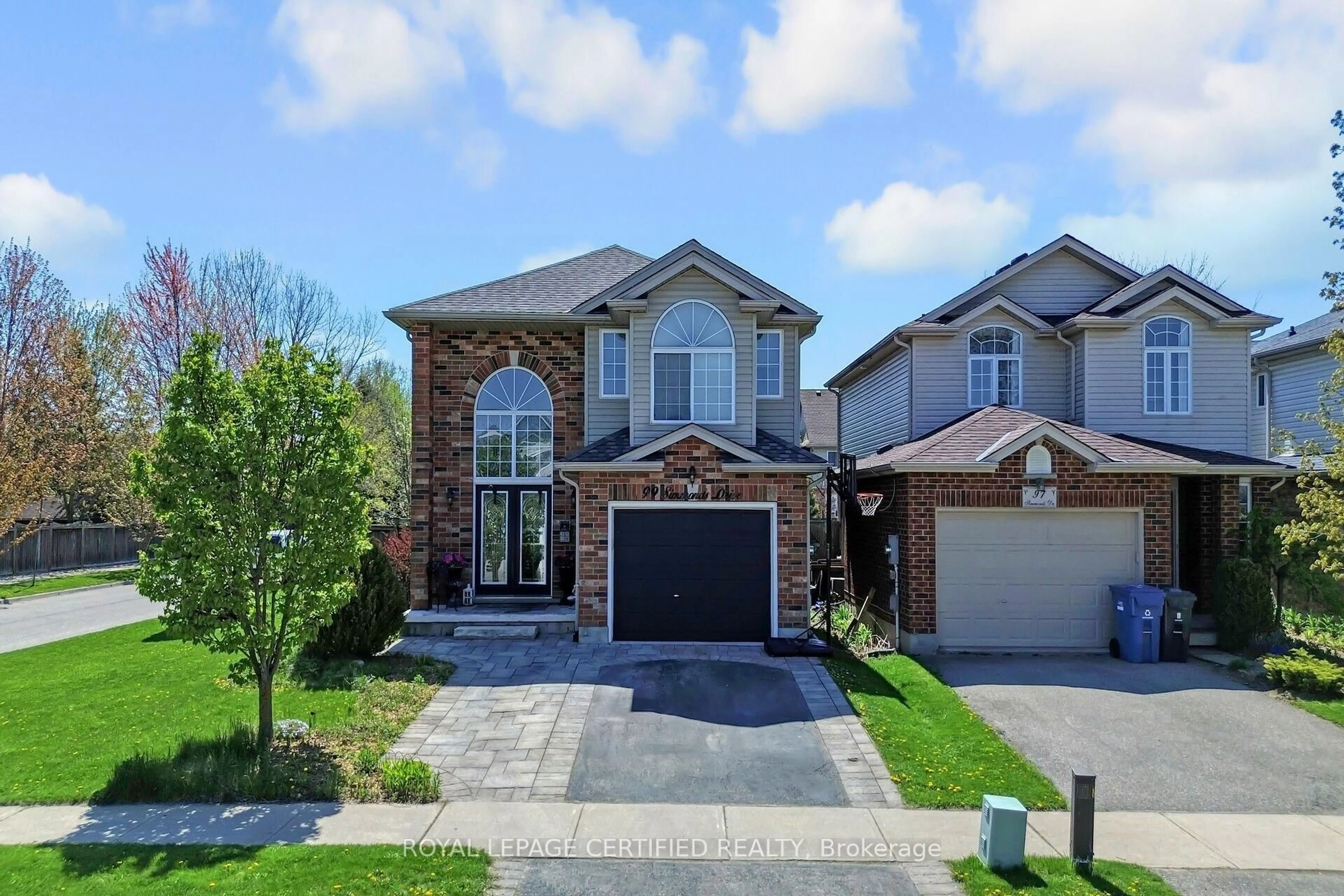 Home with brick exterior material, street for 99 Simmonds Dr, Guelph Ontario N1E 7L8