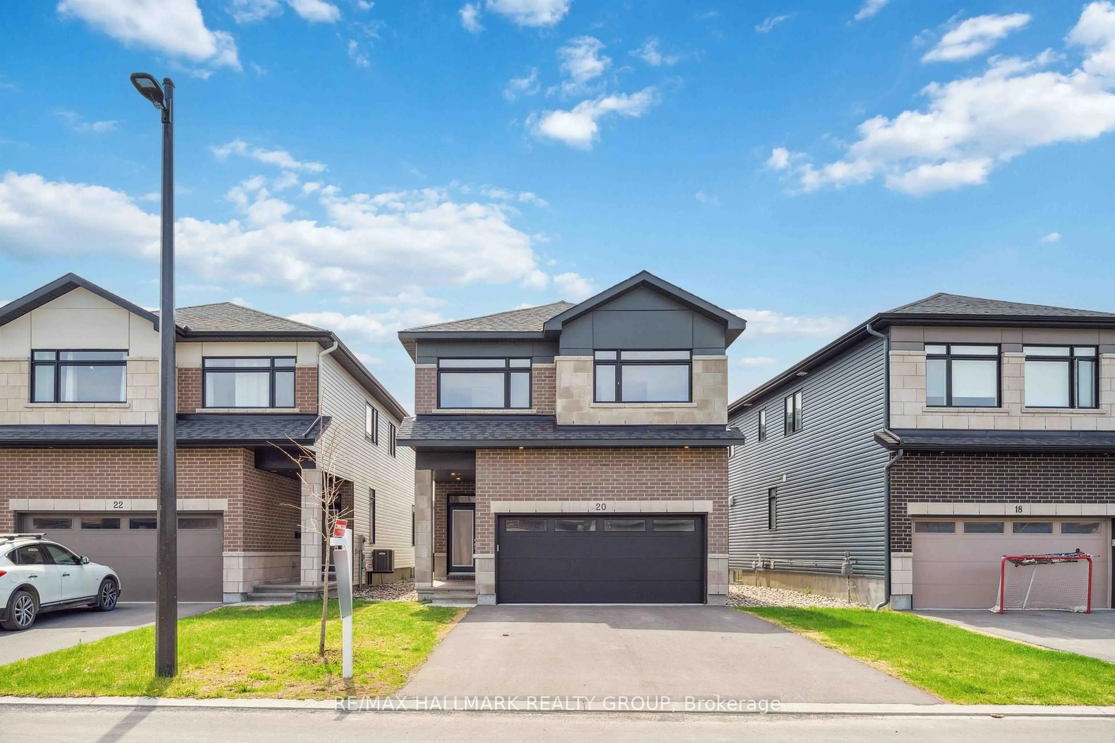 Home with brick exterior material, street for 20 Mendoza Way, Ottawa Ontario K2S 2S6