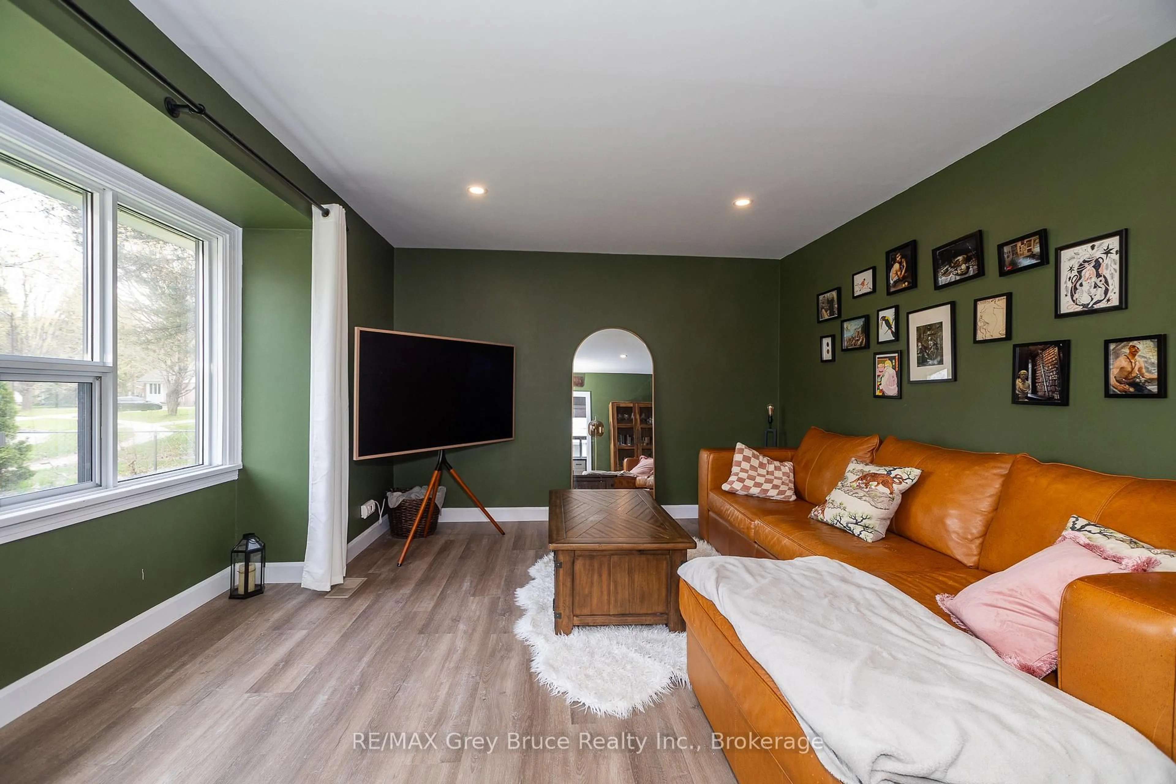 Living room with furniture, wood/laminate floor for 1368 7th Avenue A Ave, Owen Sound Ontario N4K 5L9