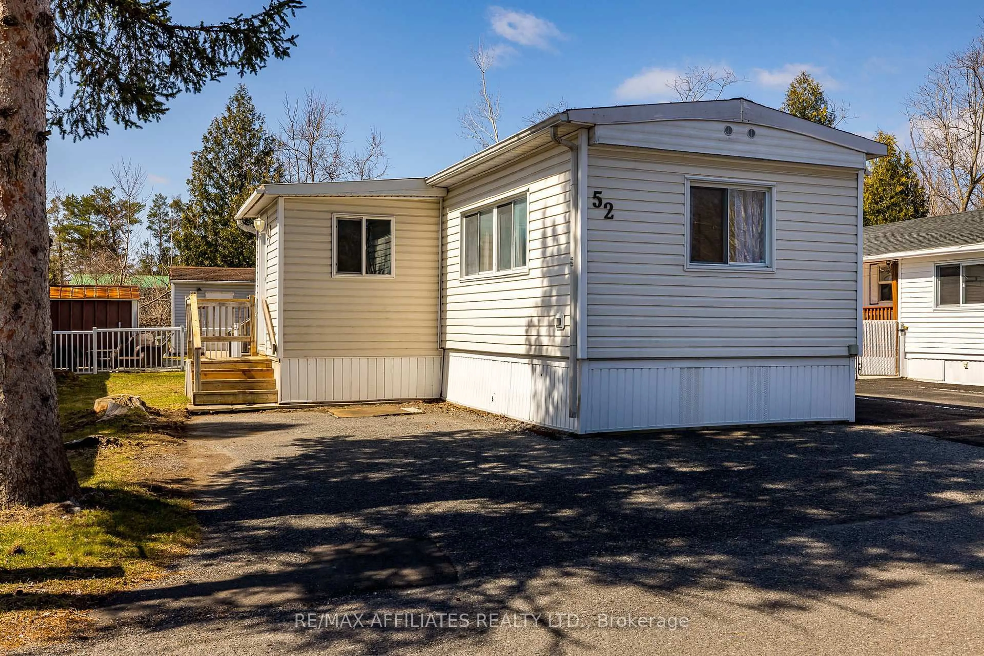 Home with vinyl exterior material, street for 52 Bradley Green Crt, Ottawa Ontario K2S 1B7