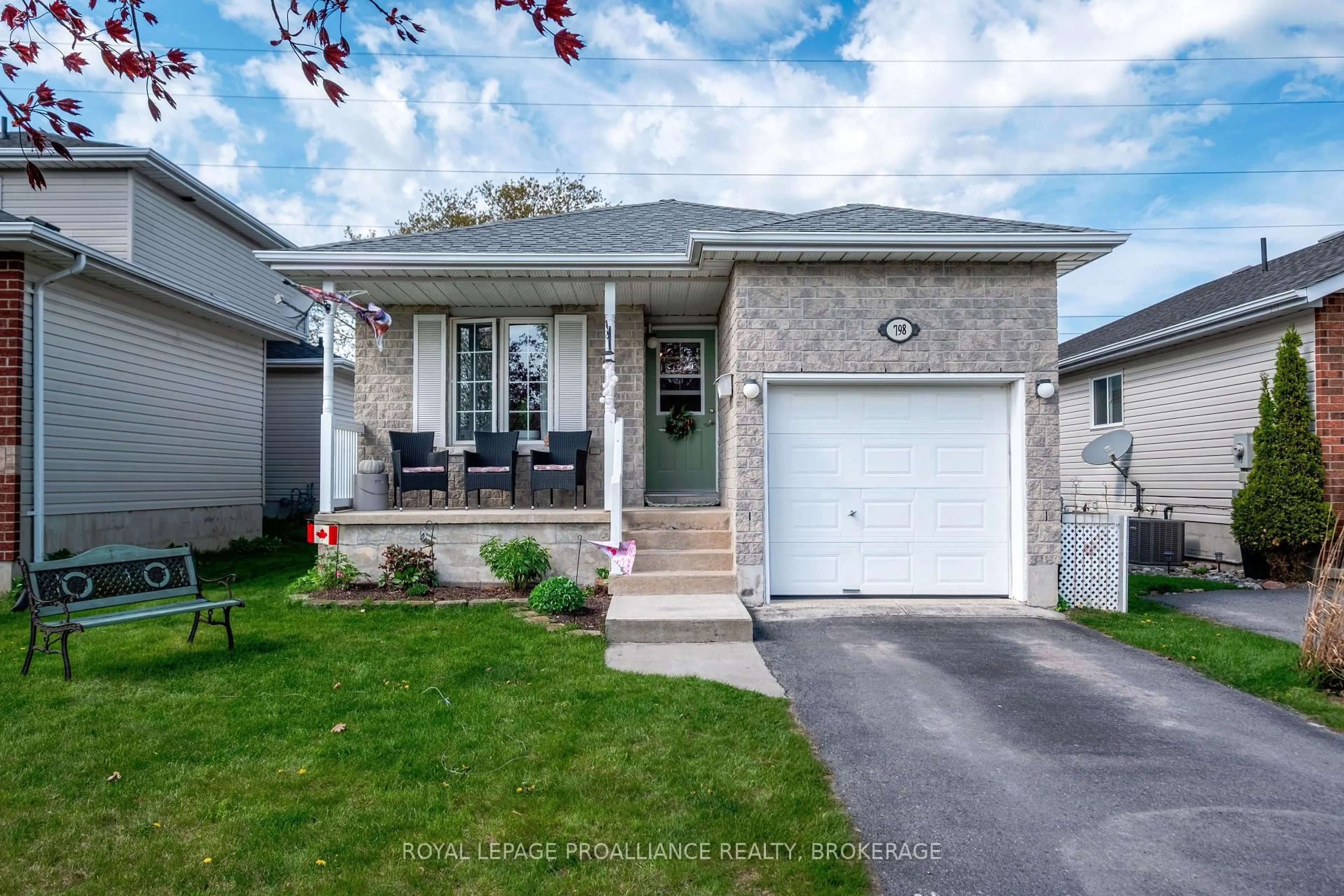 Home with vinyl exterior material, street for 798 Peachwood St, Kingston Ontario K7P 3G6