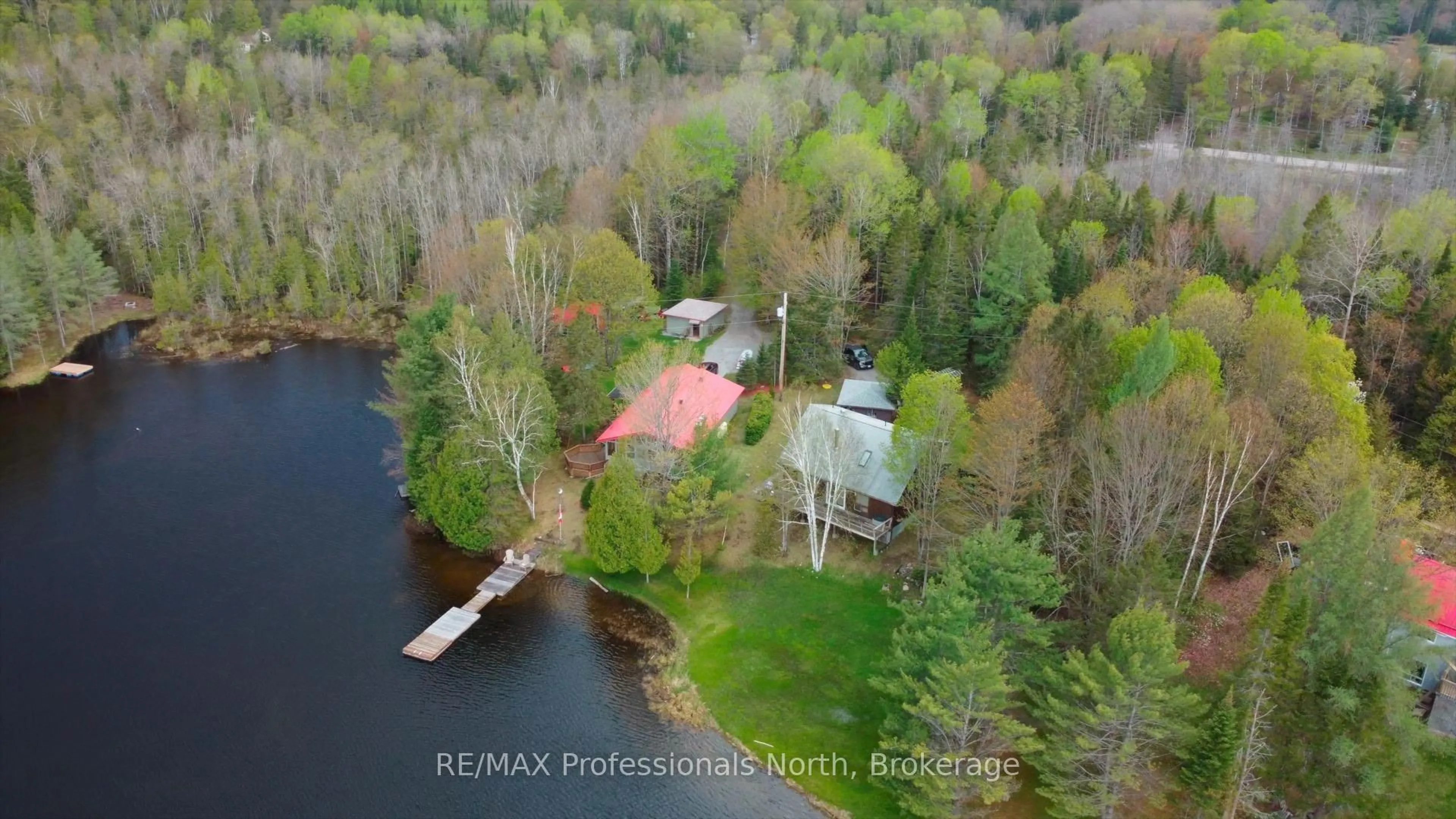 A pic from outside/outdoor area/front of a property/back of a property/a pic from drone, water/lake/river/ocean view for 1070 Glamorgan Rd, Highlands East Ontario K0M 1K0