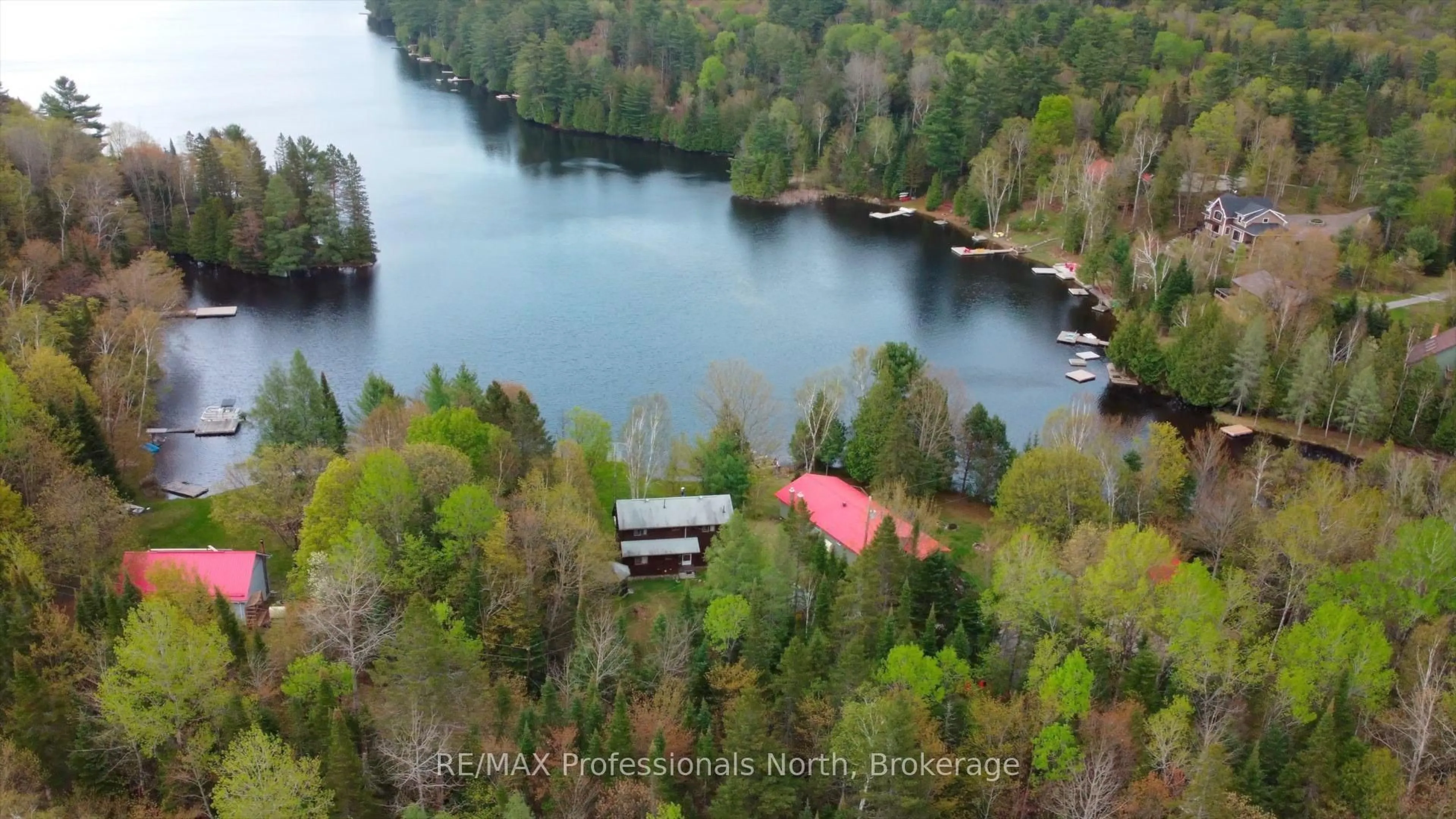 A pic from outside/outdoor area/front of a property/back of a property/a pic from drone, water/lake/river/ocean view for 1070 Glamorgan Rd, Highlands East Ontario K0M 1K0