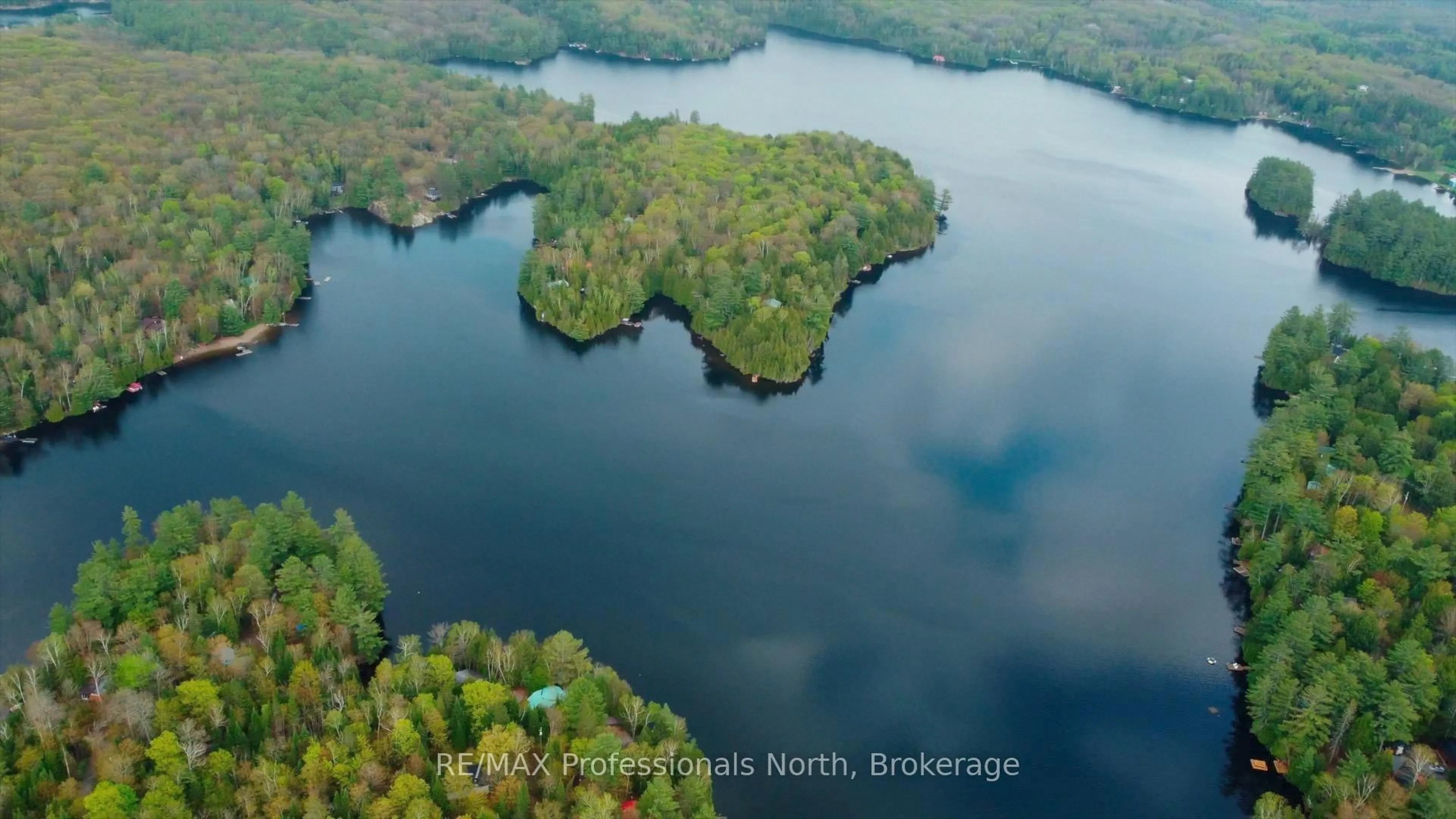 A pic from outside/outdoor area/front of a property/back of a property/a pic from drone, water/lake/river/ocean view for 1070 Glamorgan Rd, Highlands East Ontario K0M 1K0