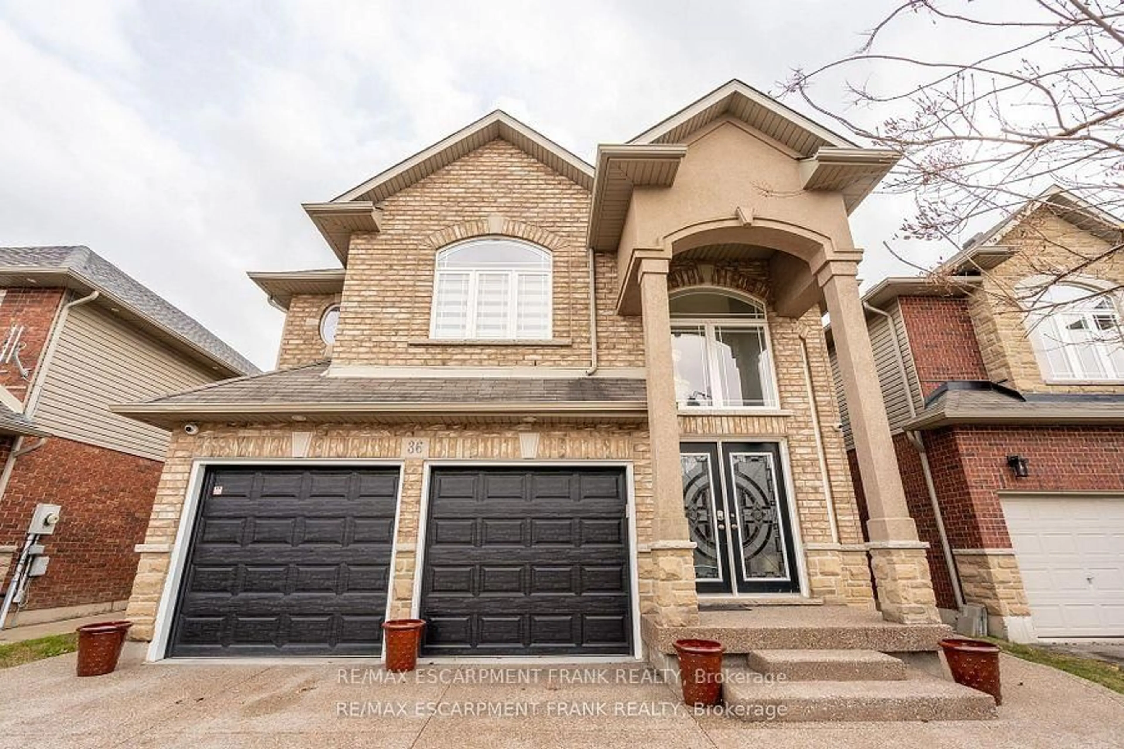 Home with brick exterior material, street for 36 Showcase Dr, Hamilton Ontario L0R 1P0