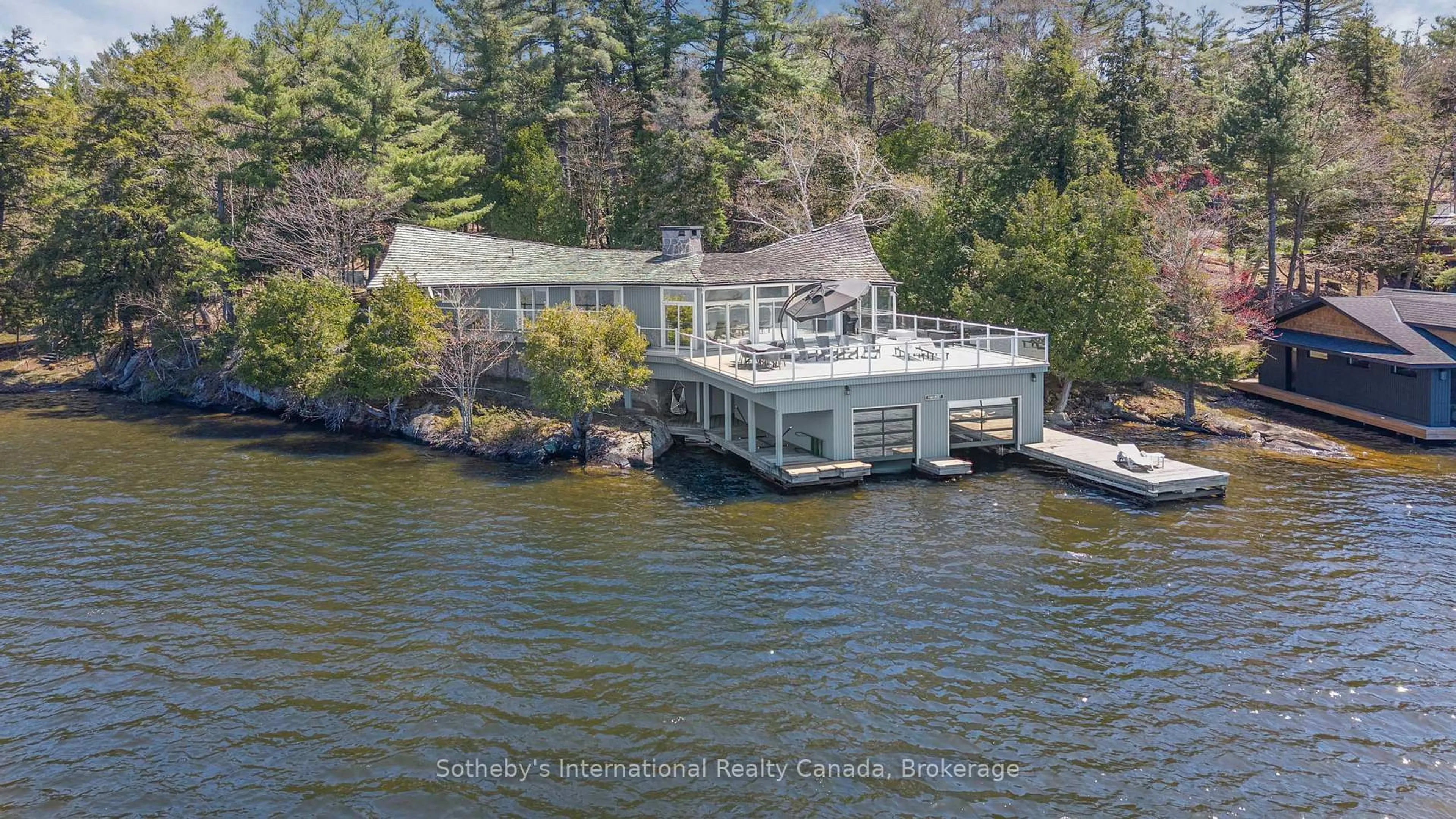 A pic from outside/outdoor area/front of a property/back of a property/a pic from drone, water/lake/river/ocean view for 1281 Brackenrig Rd #Unit 1, Muskoka Lakes Ontario P0B 1J0