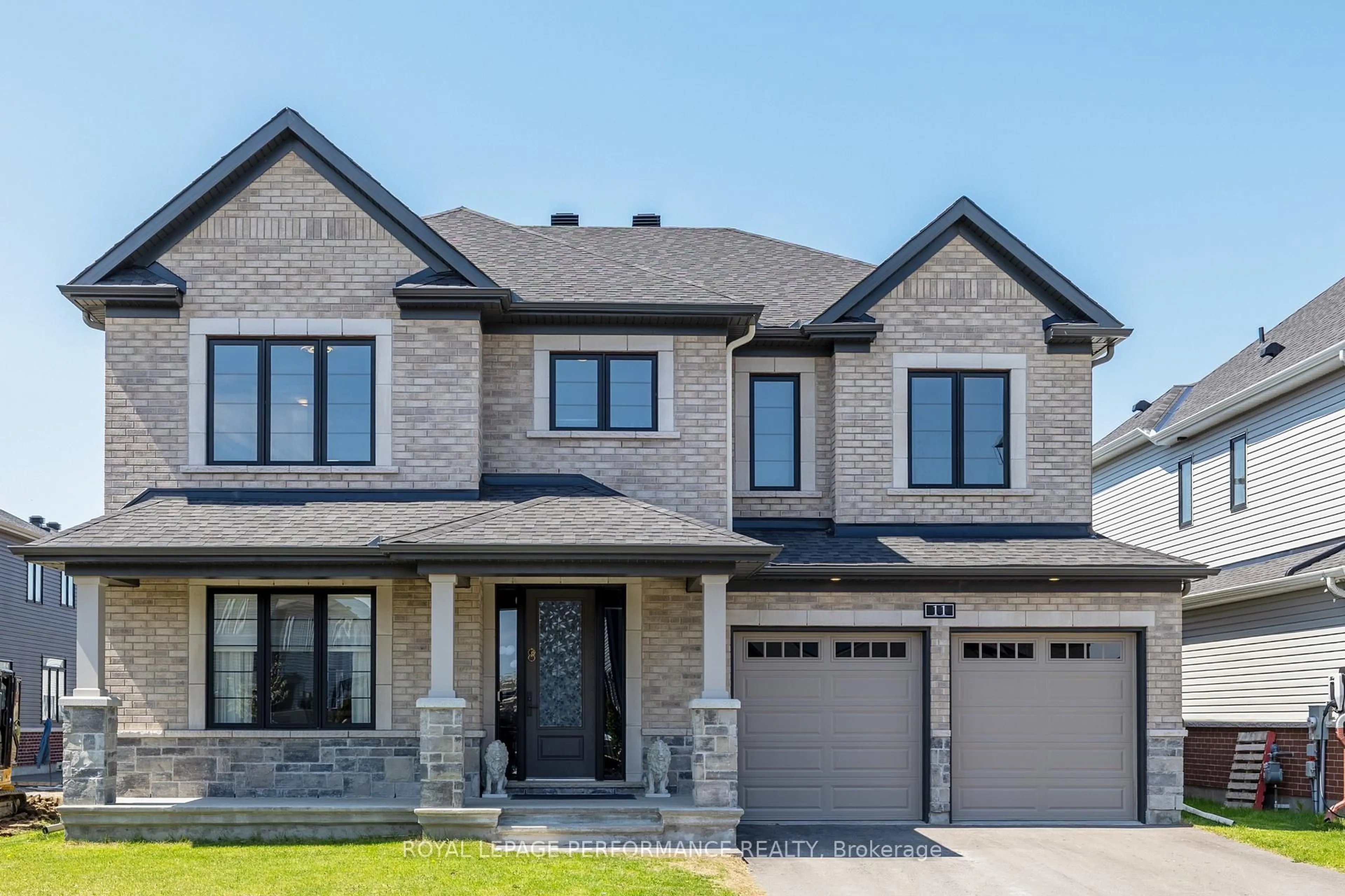 Home with brick exterior material, street for 11 Ascari Rd, Ottawa Ontario K4M 1C8