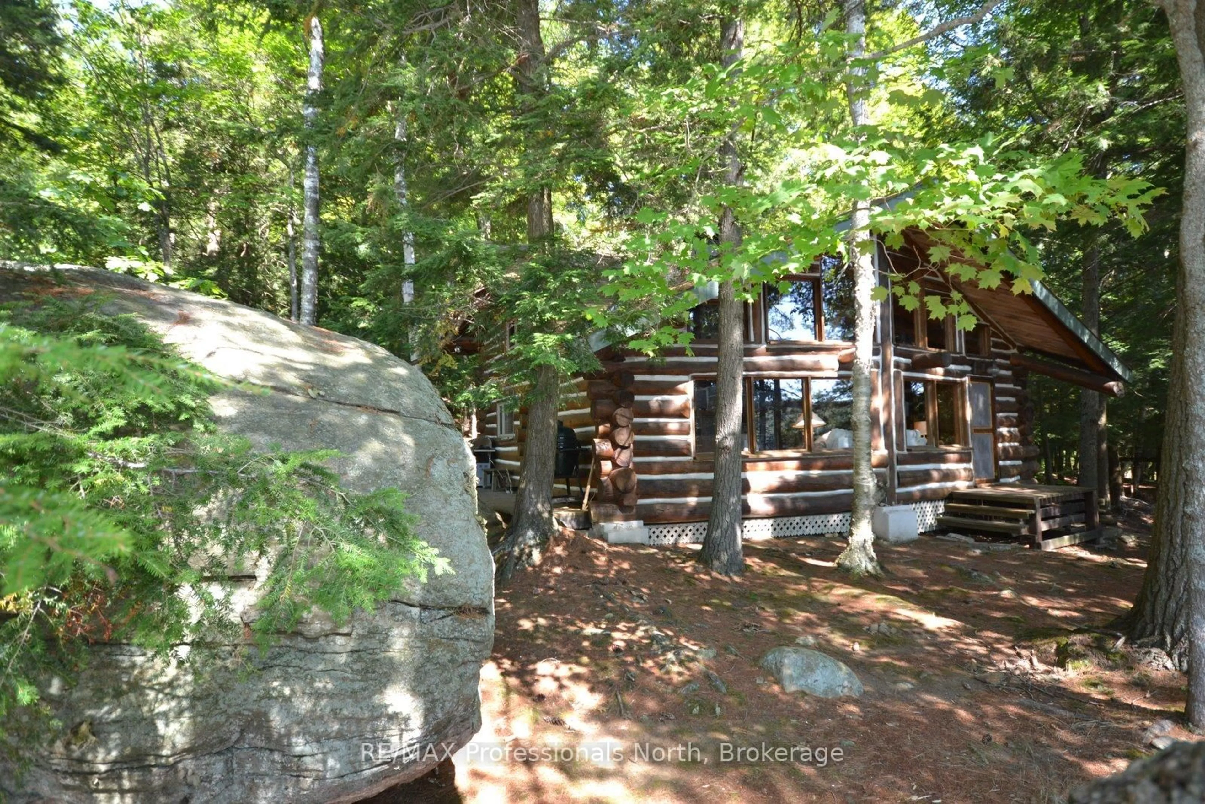 Patio, forest/trees view for 11008 Hunter Island, Dysart et al Ontario K0M 1S0