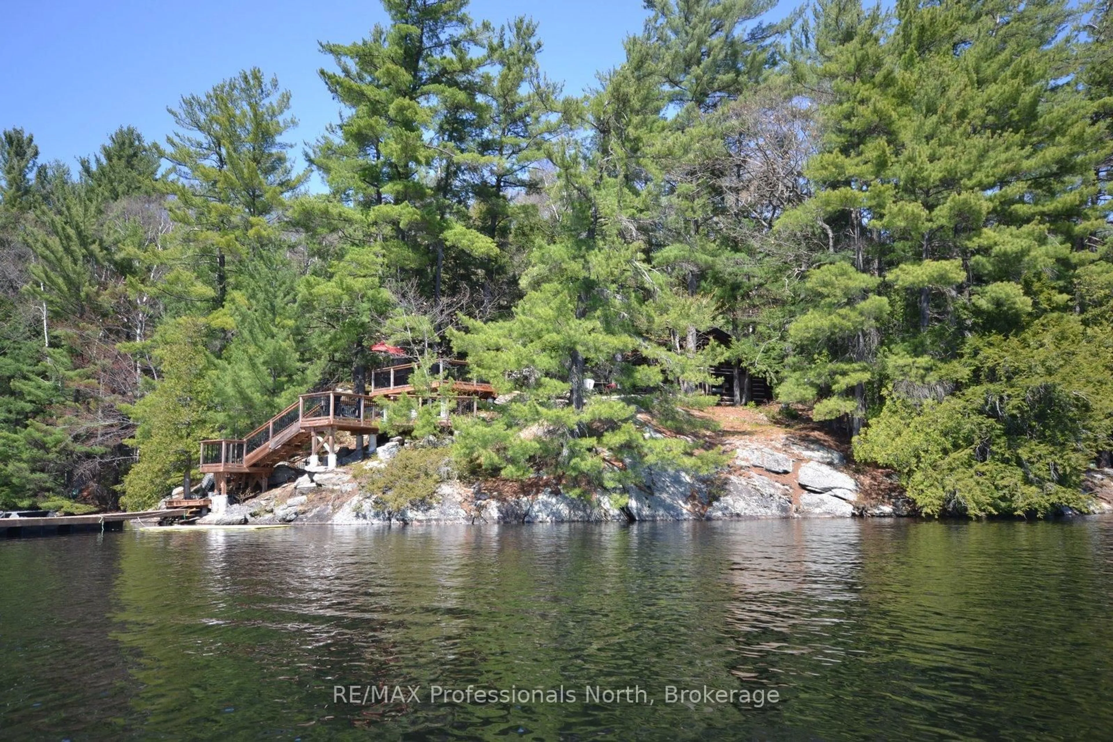 A pic from outside/outdoor area/front of a property/back of a property/a pic from drone, water/lake/river/ocean view for 11008 Hunter Island, Dysart et al Ontario K0M 1S0