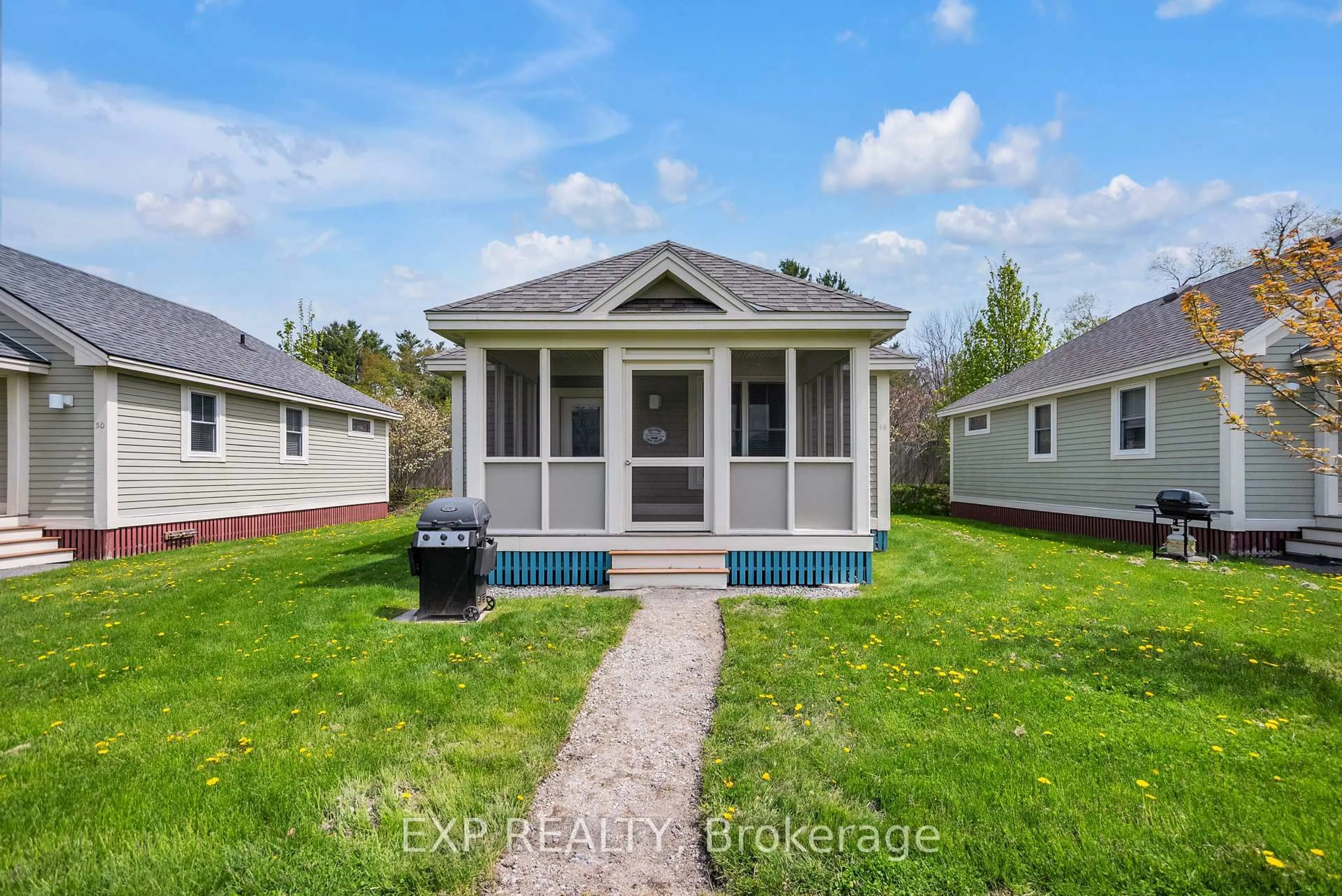 Home with vinyl exterior material, street for 48 Meadowview Lane, Prince Edward County Ontario K0K 1P0