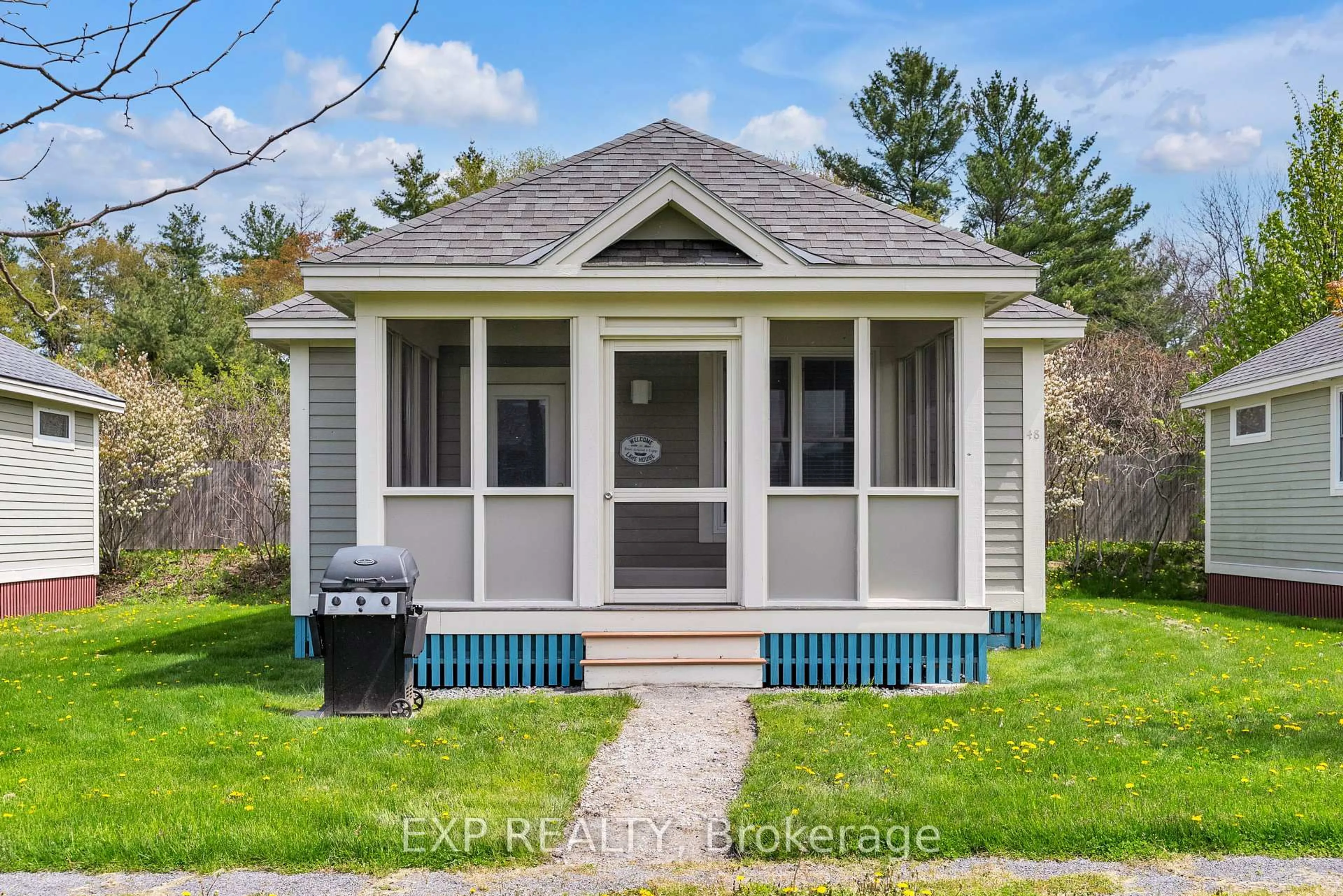 Home with vinyl exterior material, street for 48 Meadowview Lane, Prince Edward County Ontario K0K 1P0