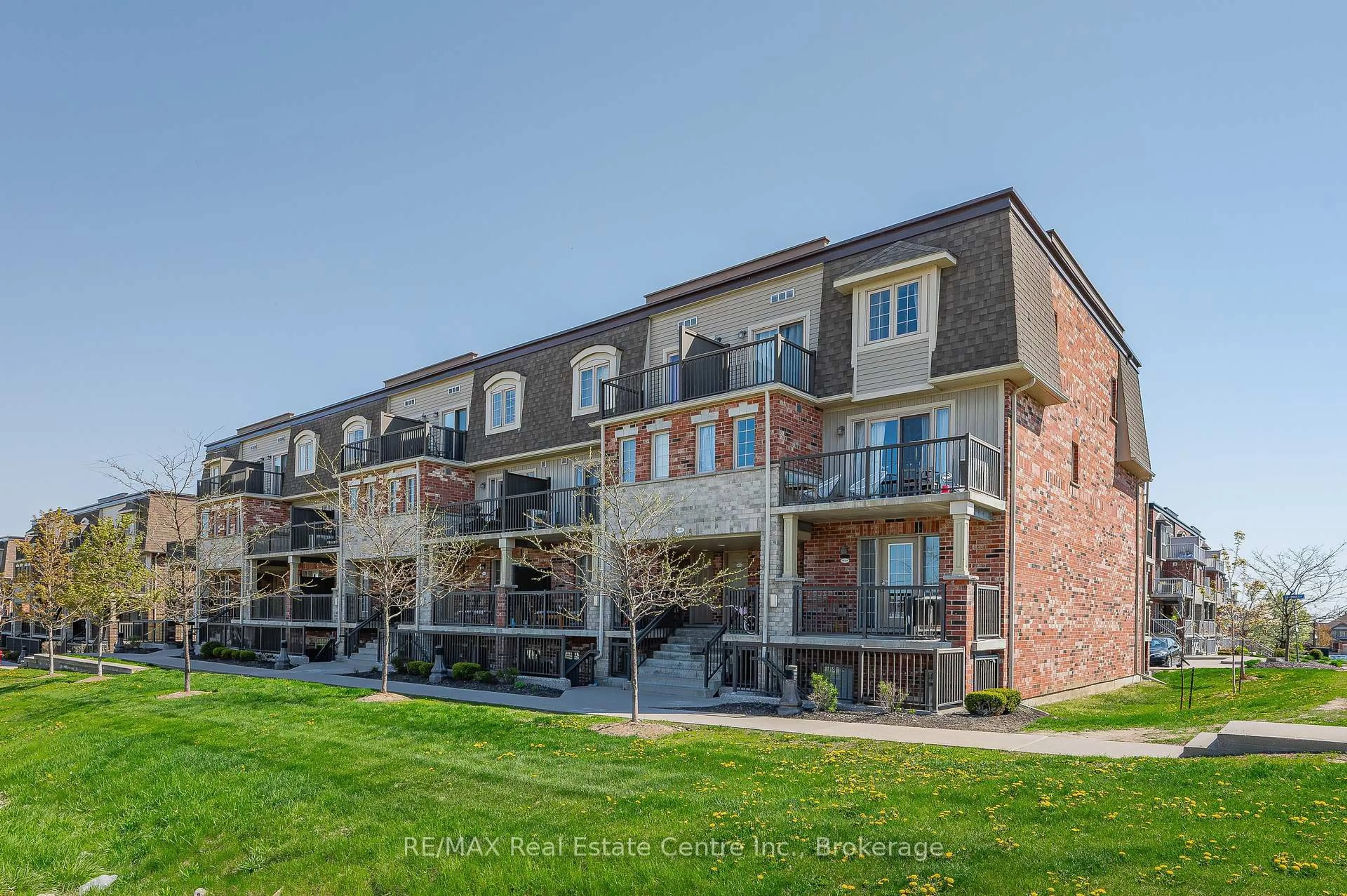 A pic from outside/outdoor area/front of a property/back of a property/a pic from drone, unknown for 1676 Fischer Hallman Rd #C, Kitchener Ontario N2R 0H9
