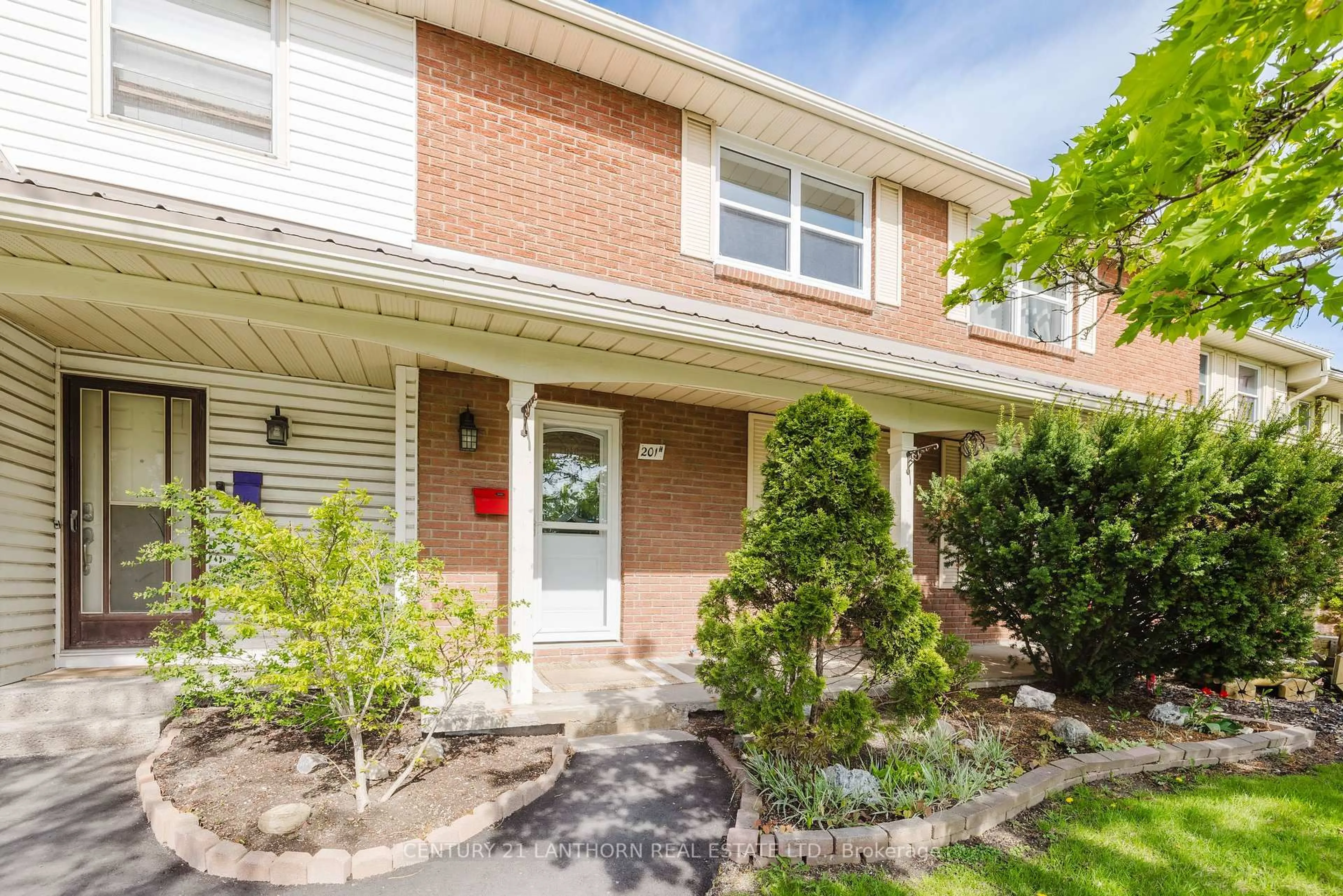 Home with brick exterior material, street for 201 North Park St #H, Belleville Ontario K8P 4T9