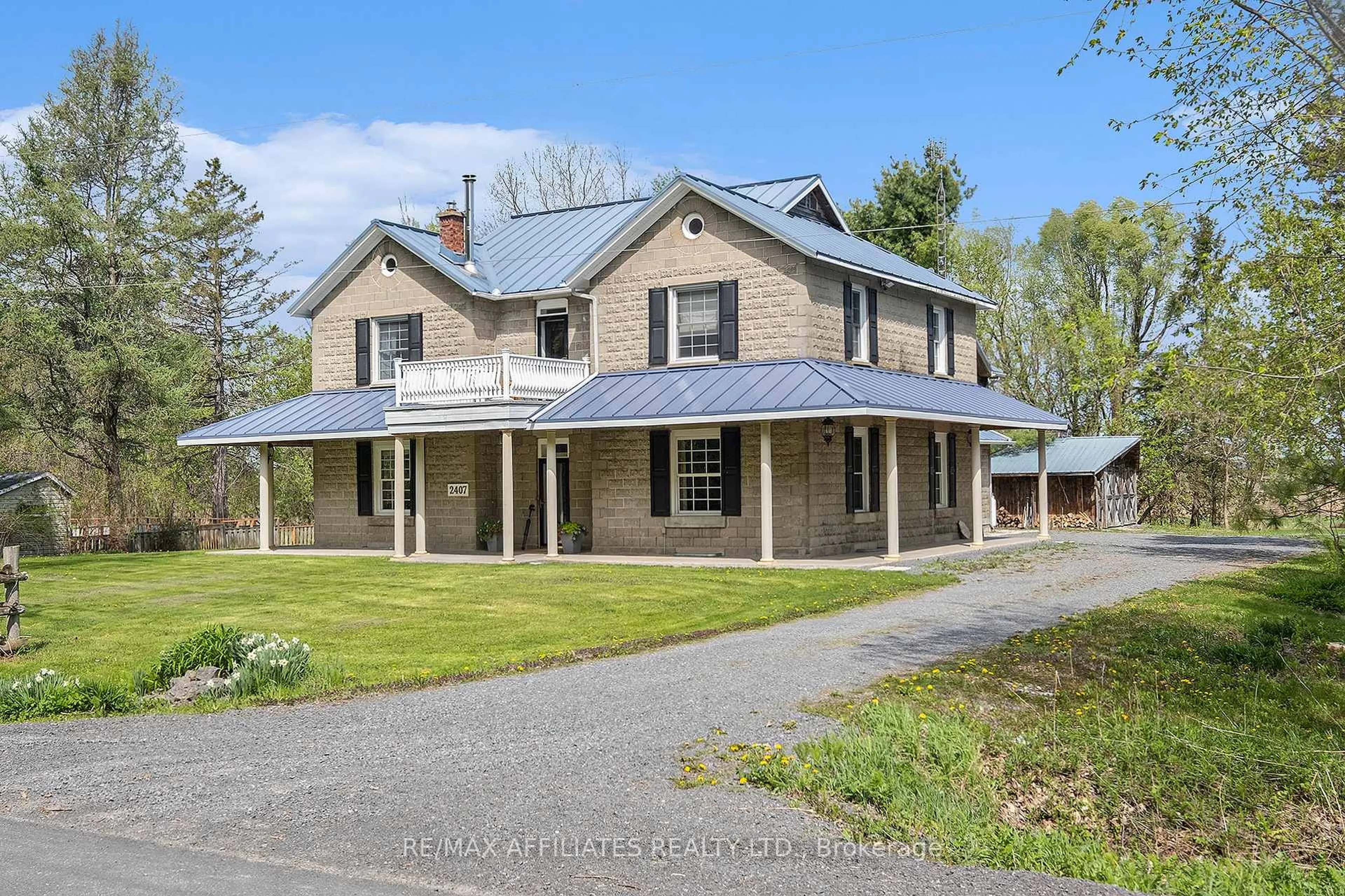 A pic from outside/outdoor area/front of a property/back of a property/a pic from drone, street for 2407 County Rd 16 Rd, Casselman Ontario K0A 1M0