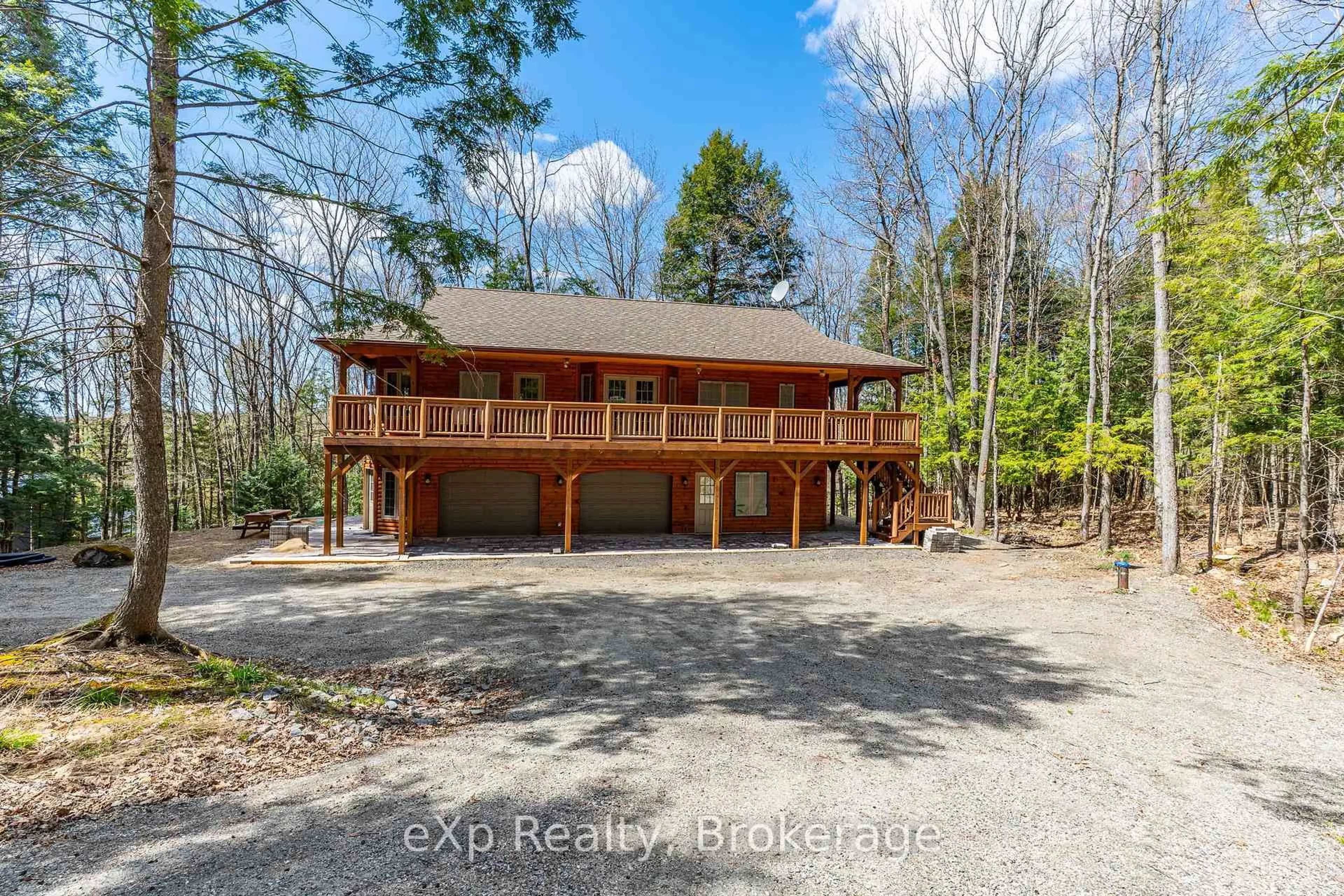 A pic from outside/outdoor area/front of a property/back of a property/a pic from drone, water/lake/river/ocean view for 35 Keefer St, Dysart et al Ontario K0M 1S0