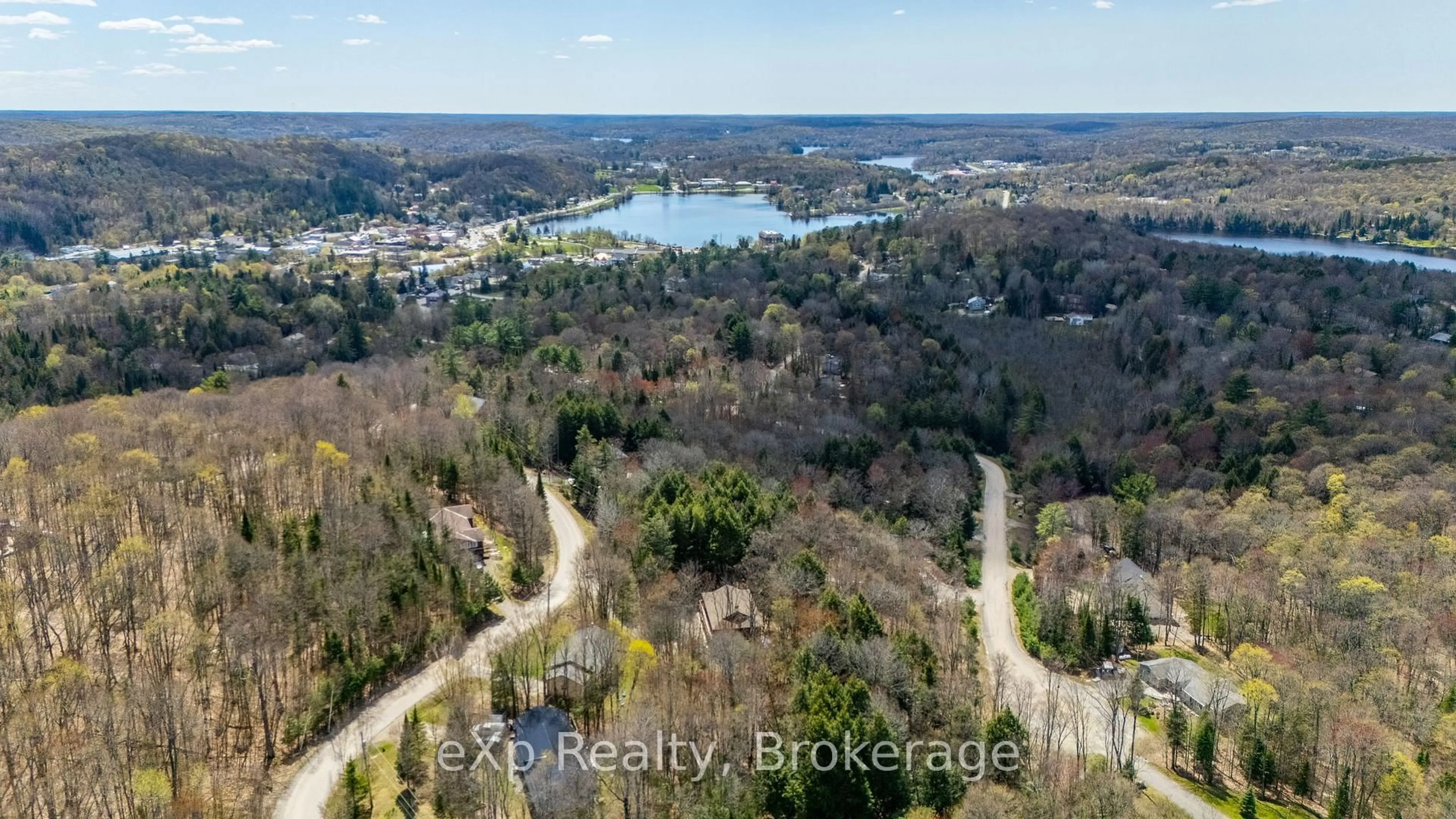 A pic from outside/outdoor area/front of a property/back of a property/a pic from drone, water/lake/river/ocean view for 35 Keefer St, Dysart et al Ontario K0M 1S0