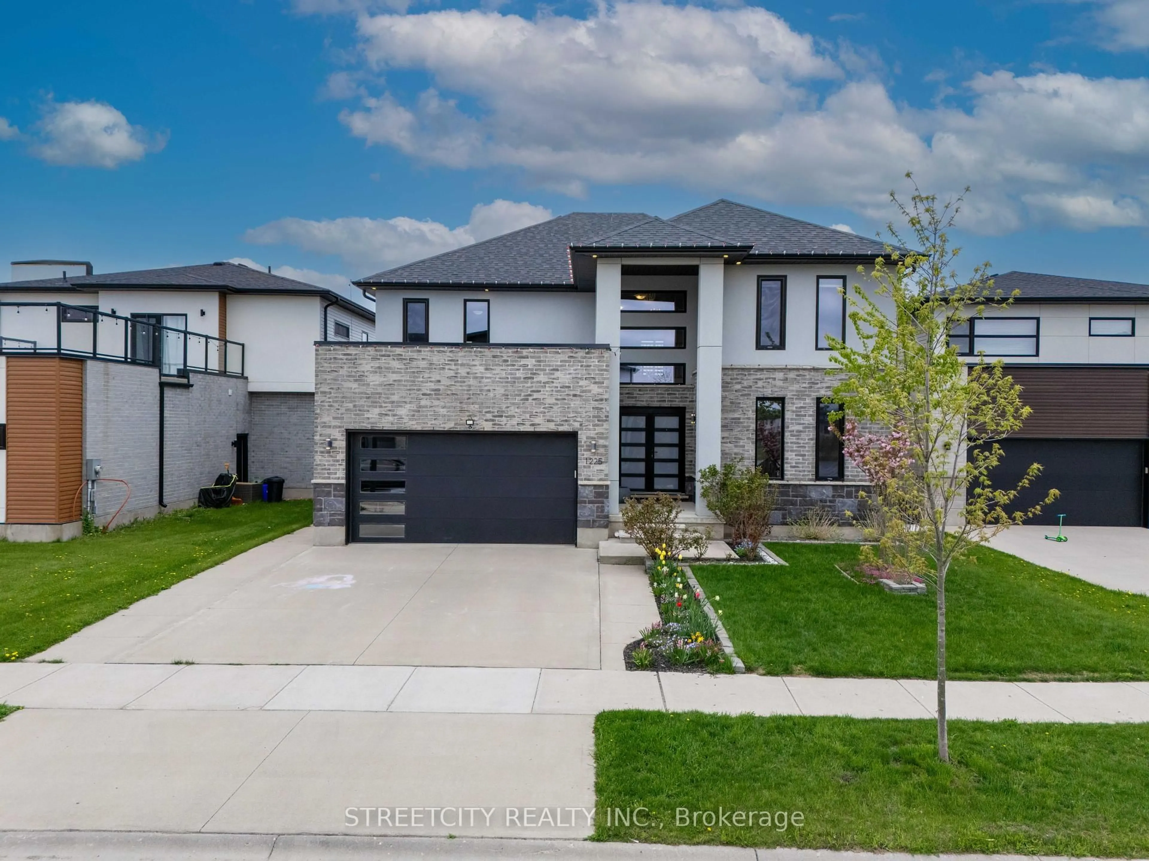 Home with brick exterior material, street for 1225 Silverfox Dr, London North Ontario N6G 0V8