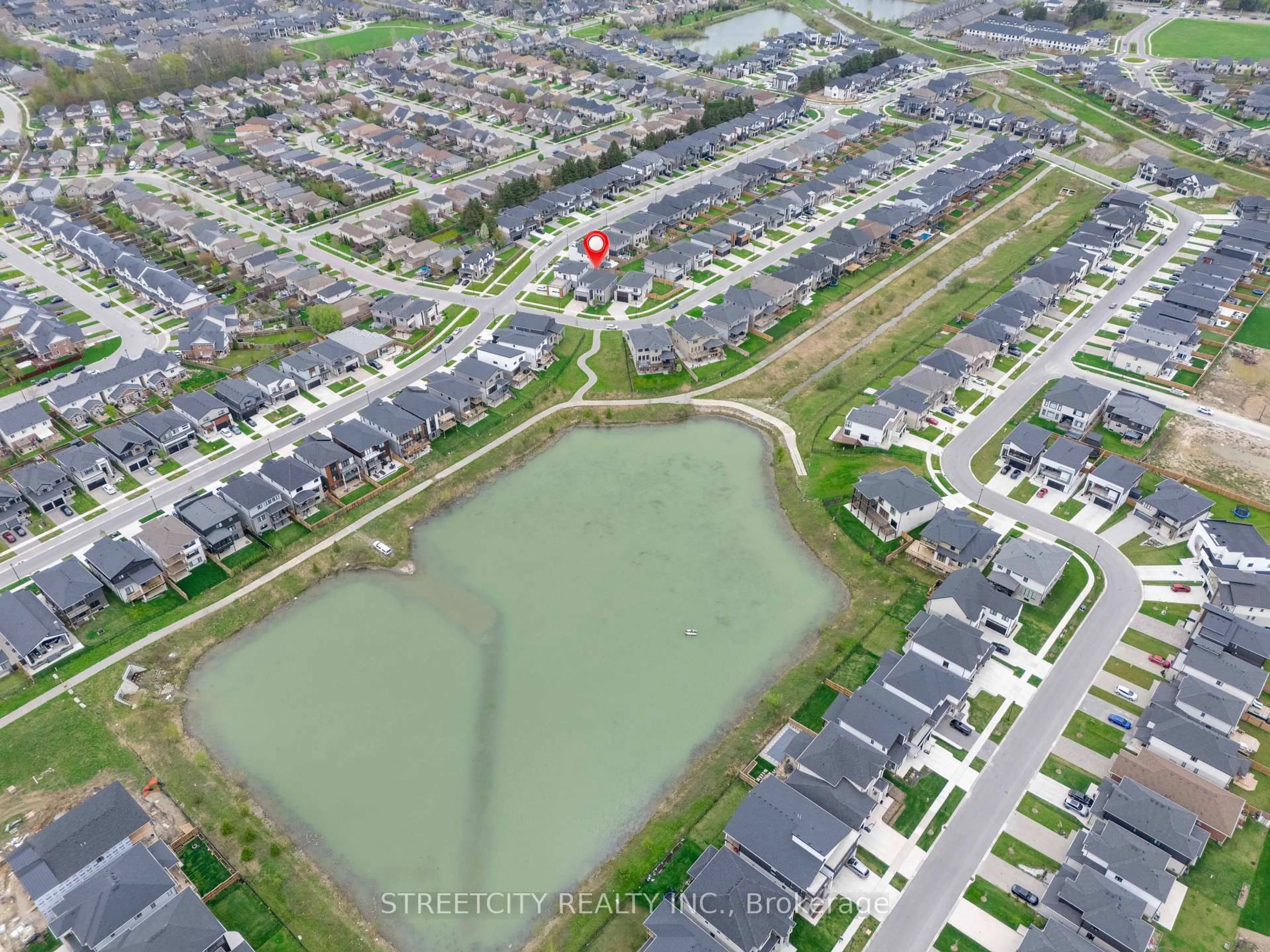 A pic from outside/outdoor area/front of a property/back of a property/a pic from drone, water/lake/river/ocean view for 1225 Silverfox Dr, London North Ontario N6G 0V8