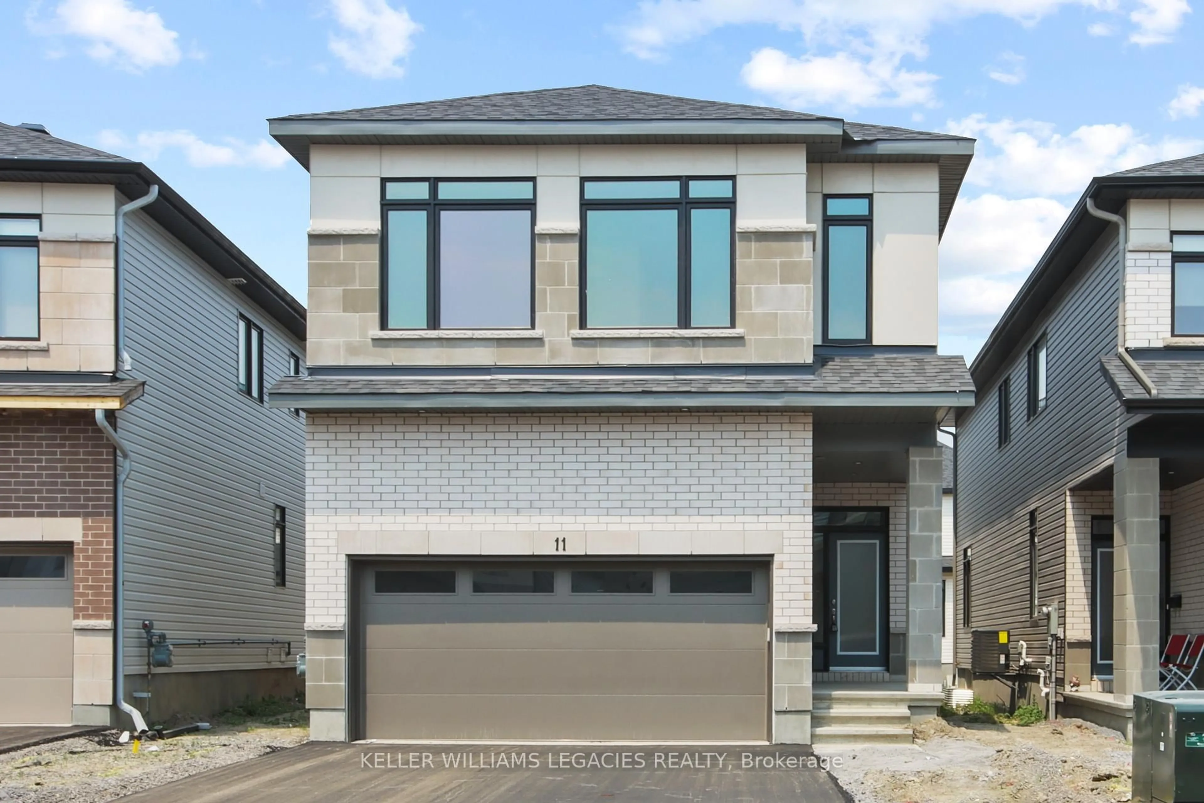 Home with brick exterior material, street for 11 Mendoza Way, Ottawa Ontario K2S 1B6