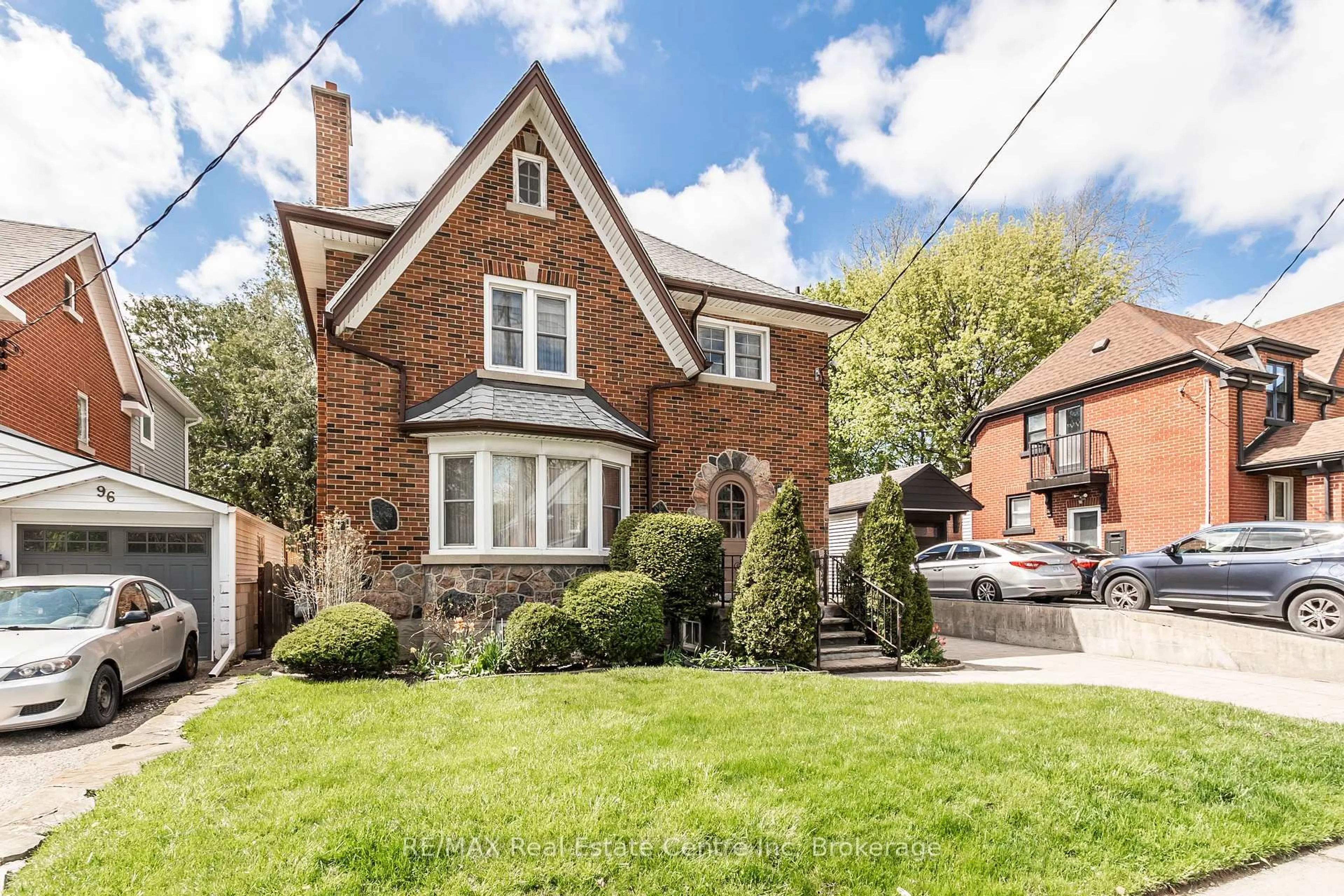 Home with brick exterior material, street for 100 Borden Ave, Kitchener Ontario N2H 3J4