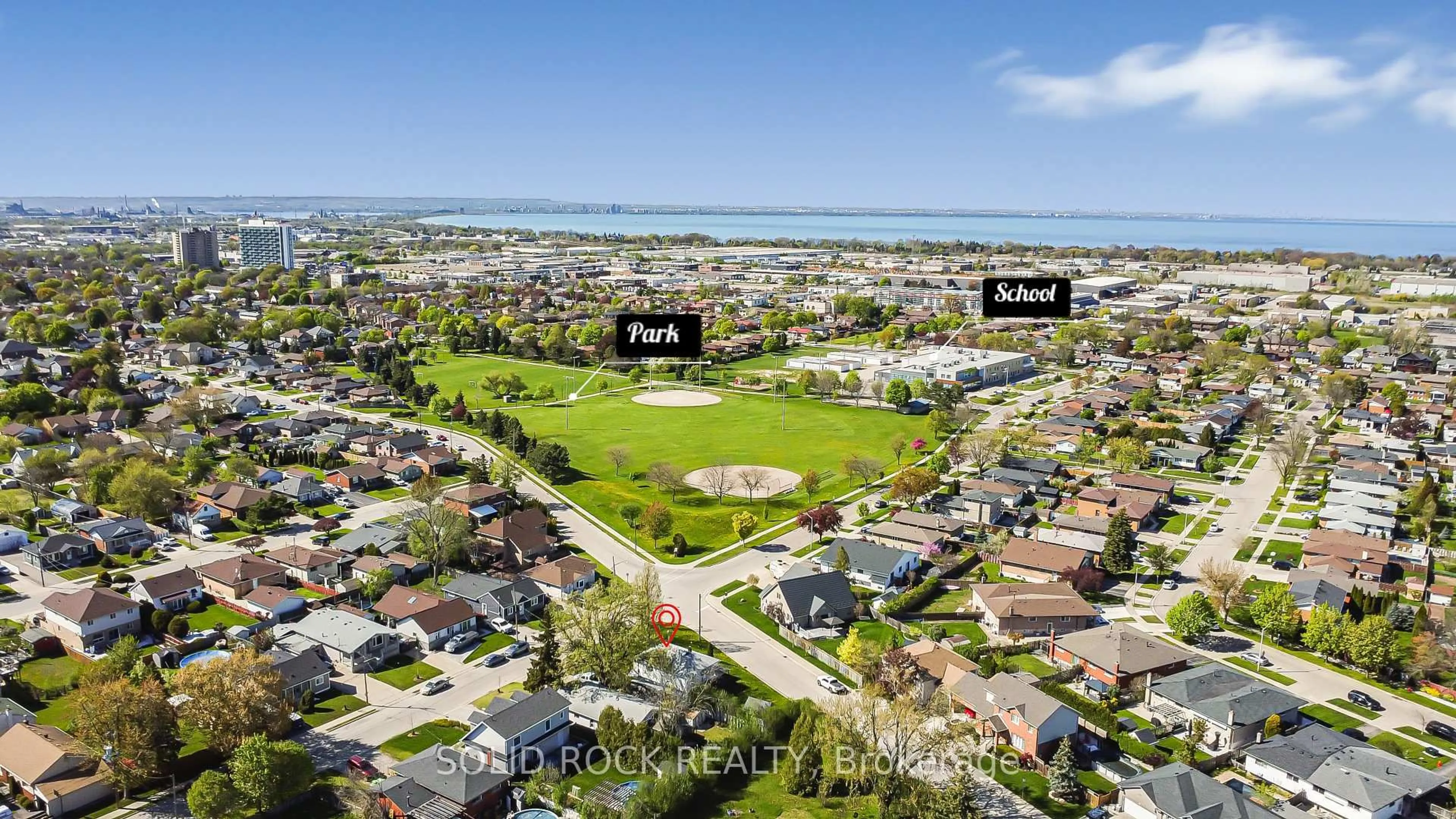 A pic from outside/outdoor area/front of a property/back of a property/a pic from drone, water/lake/river/ocean view for 60 Lincoln Rd, Hamilton Ontario L8E 1Z3