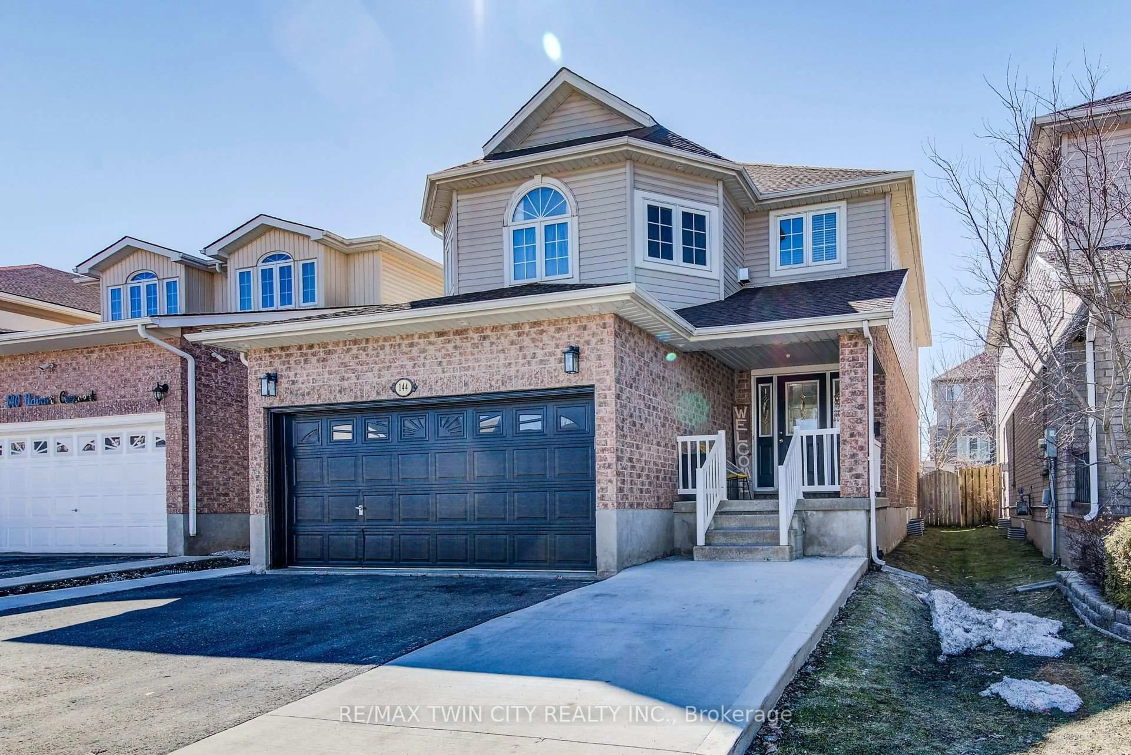 Home with brick exterior material, street for 144 Udvari Cres, Kitchener Ontario N2N 3P6