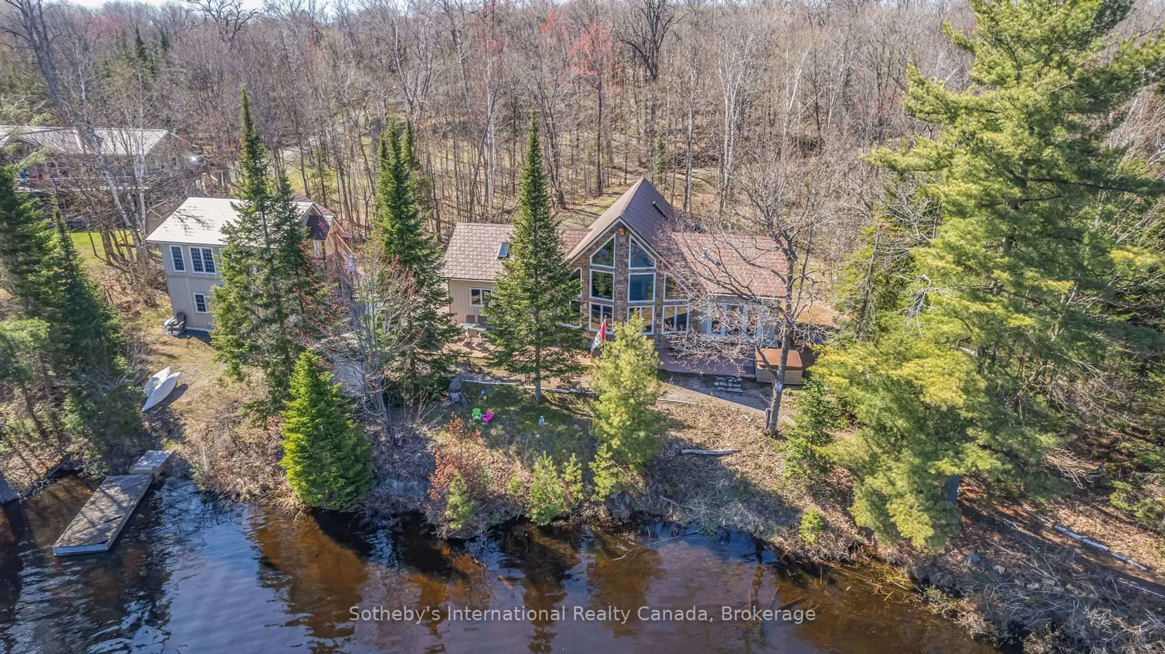 A pic from outside/outdoor area/front of a property/back of a property/a pic from drone, water/lake/river/ocean view for 9 Pauls Bay Rd, McDougall Ontario P2A 2W7