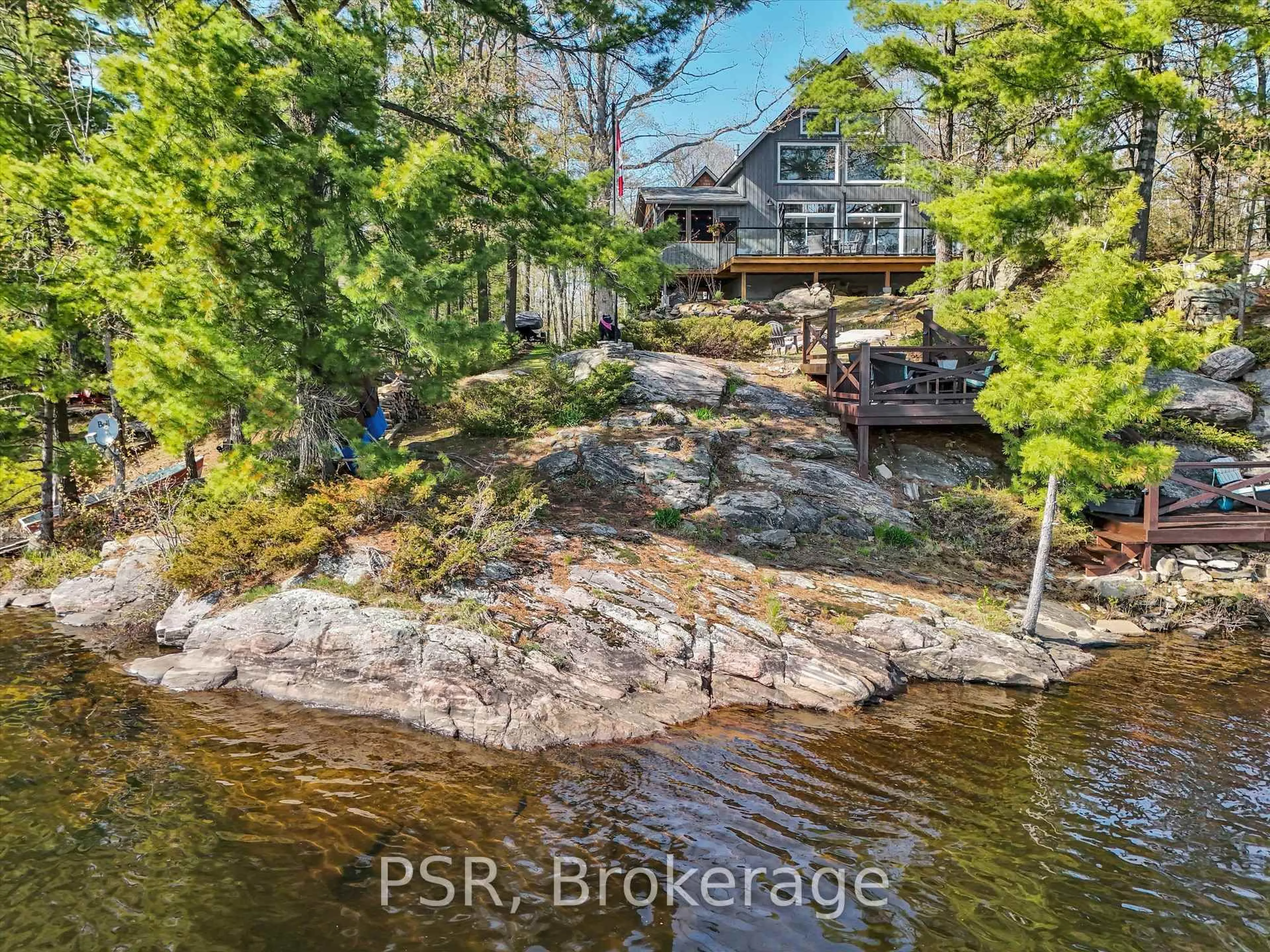 A pic from outside/outdoor area/front of a property/back of a property/a pic from drone, water/lake/river/ocean view for 1028 Marshall Dr, Gravenhurst Ontario P1P 1R2