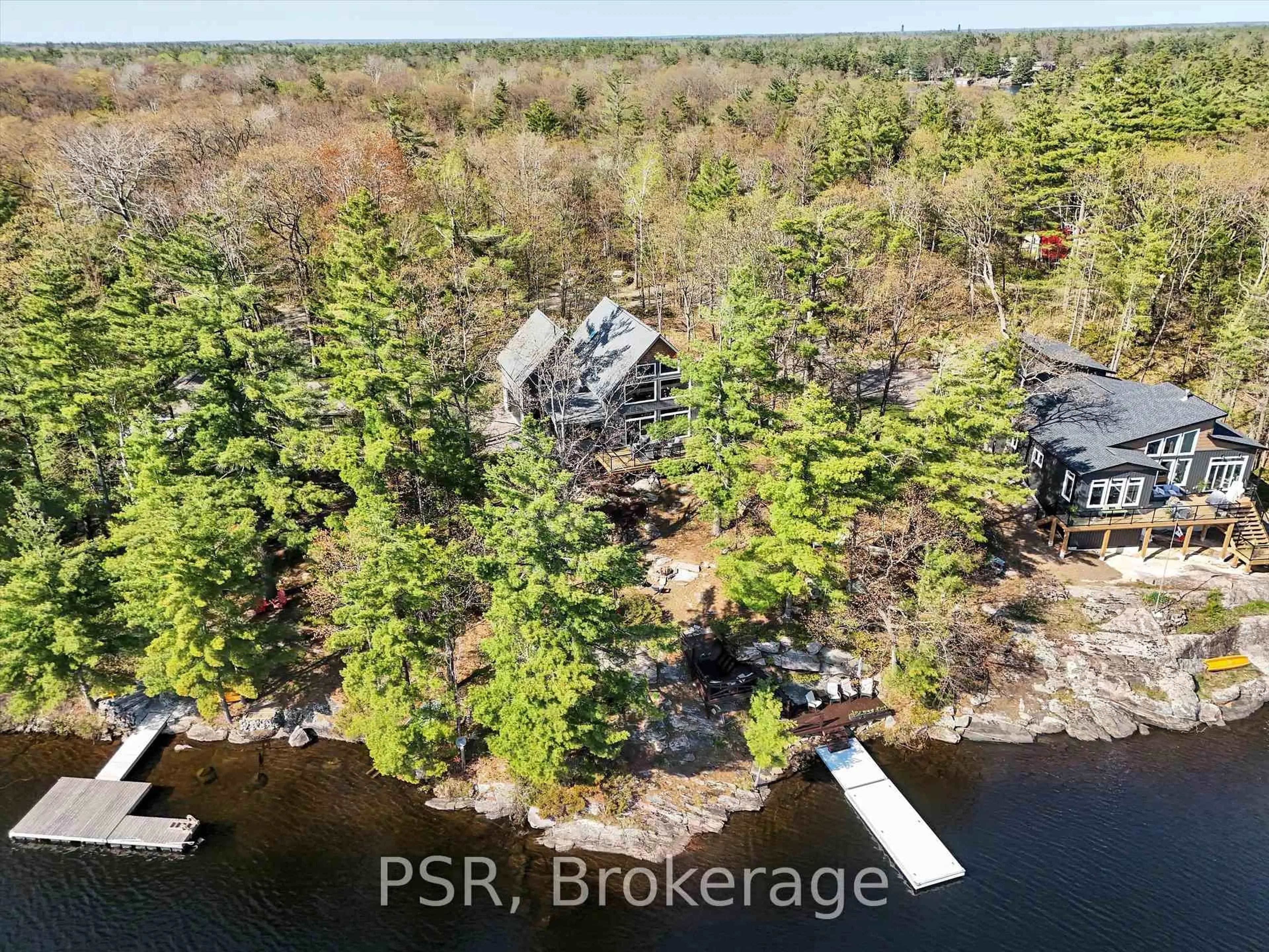 A pic from outside/outdoor area/front of a property/back of a property/a pic from drone, water/lake/river/ocean view for 1028 Marshall Dr, Gravenhurst Ontario P1P 1R2