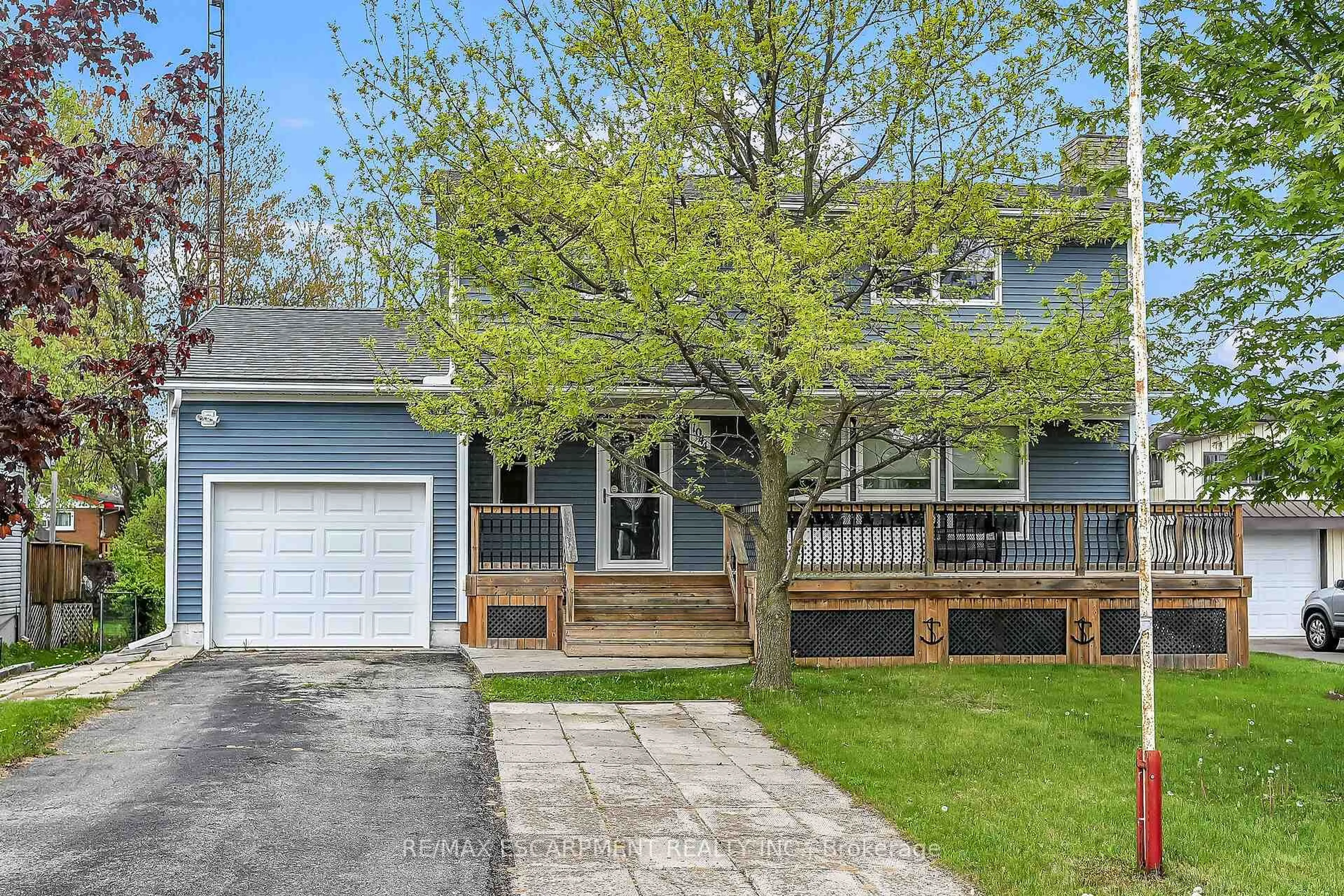 Home with vinyl exterior material, street for 1044 Main St, Norfolk Ontario N0A 1N2