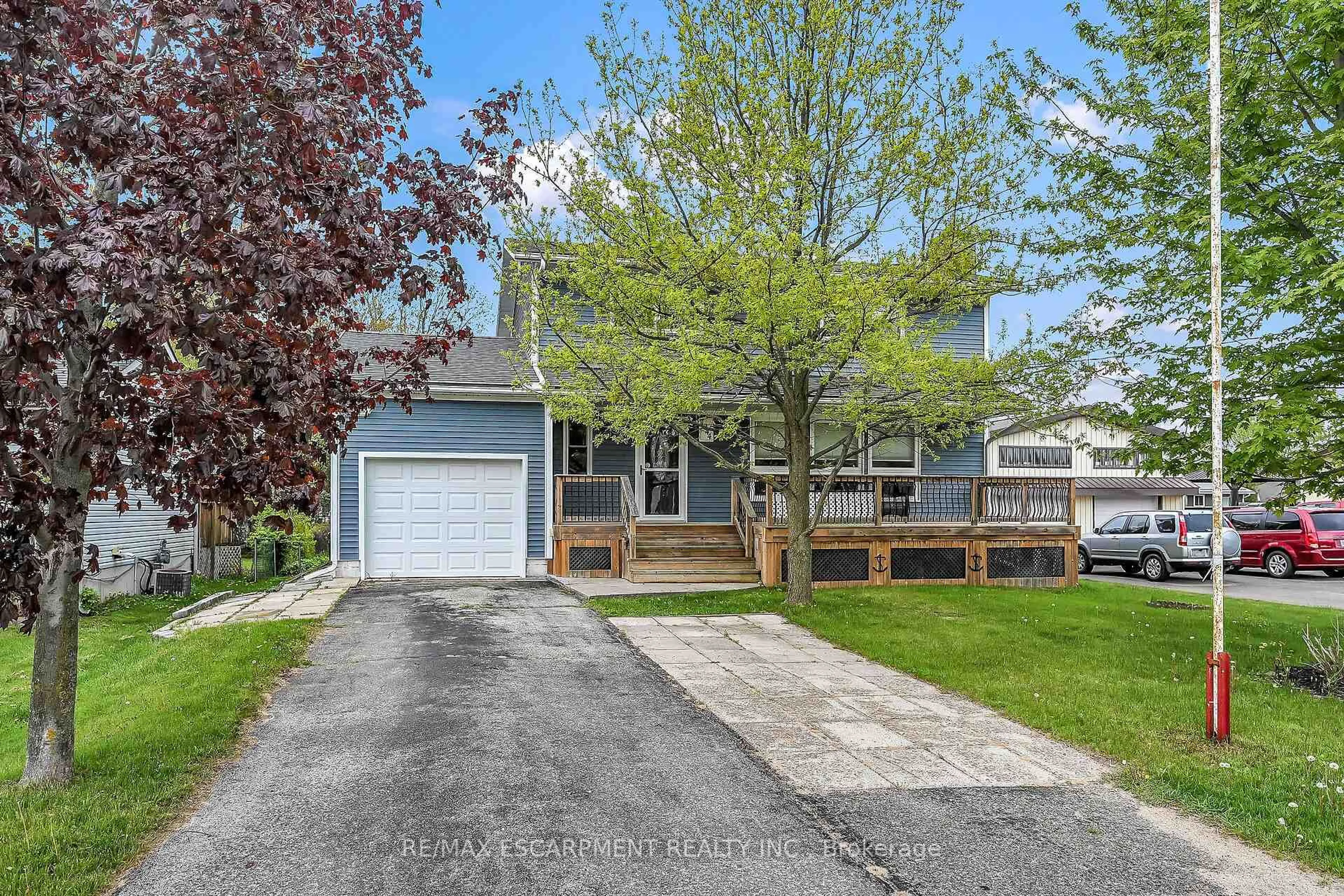 Home with vinyl exterior material, street for 1044 Main St, Norfolk Ontario N0A 1N2