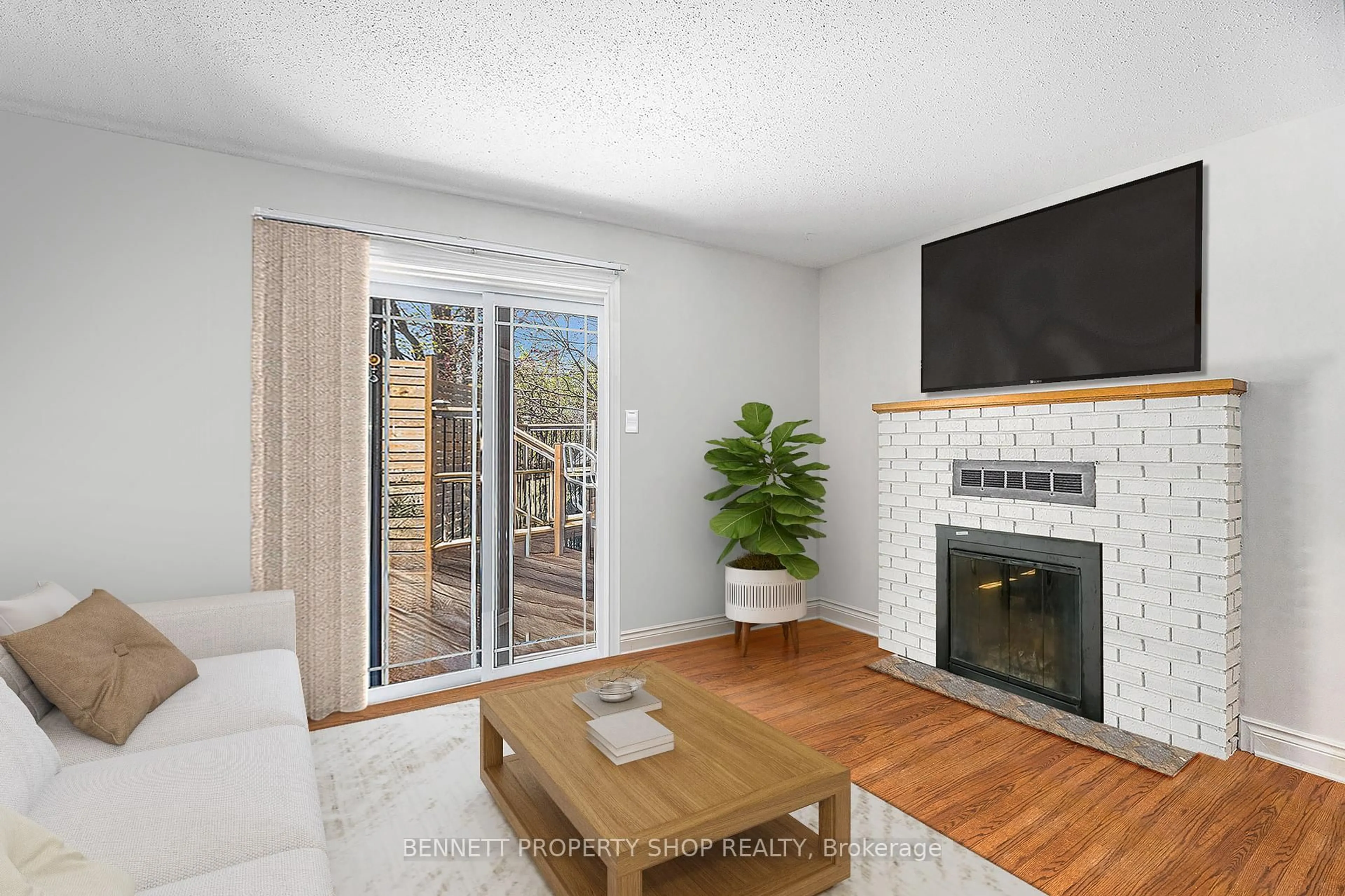 Living room with furniture, wood/laminate floor for 1404 Eastcliffe Way, Gloucester Ontario K1B 5H6