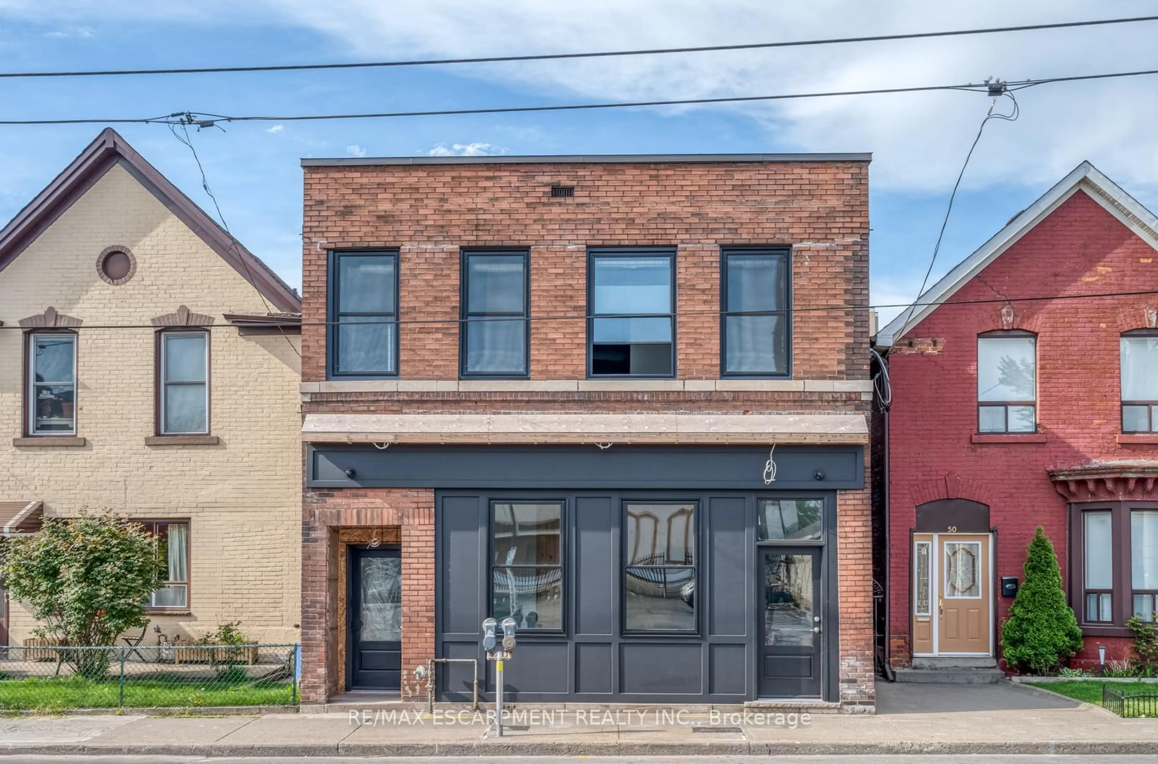 Home with brick exterior material, street for 52 Barton St, Hamilton Ontario L8L 2V8