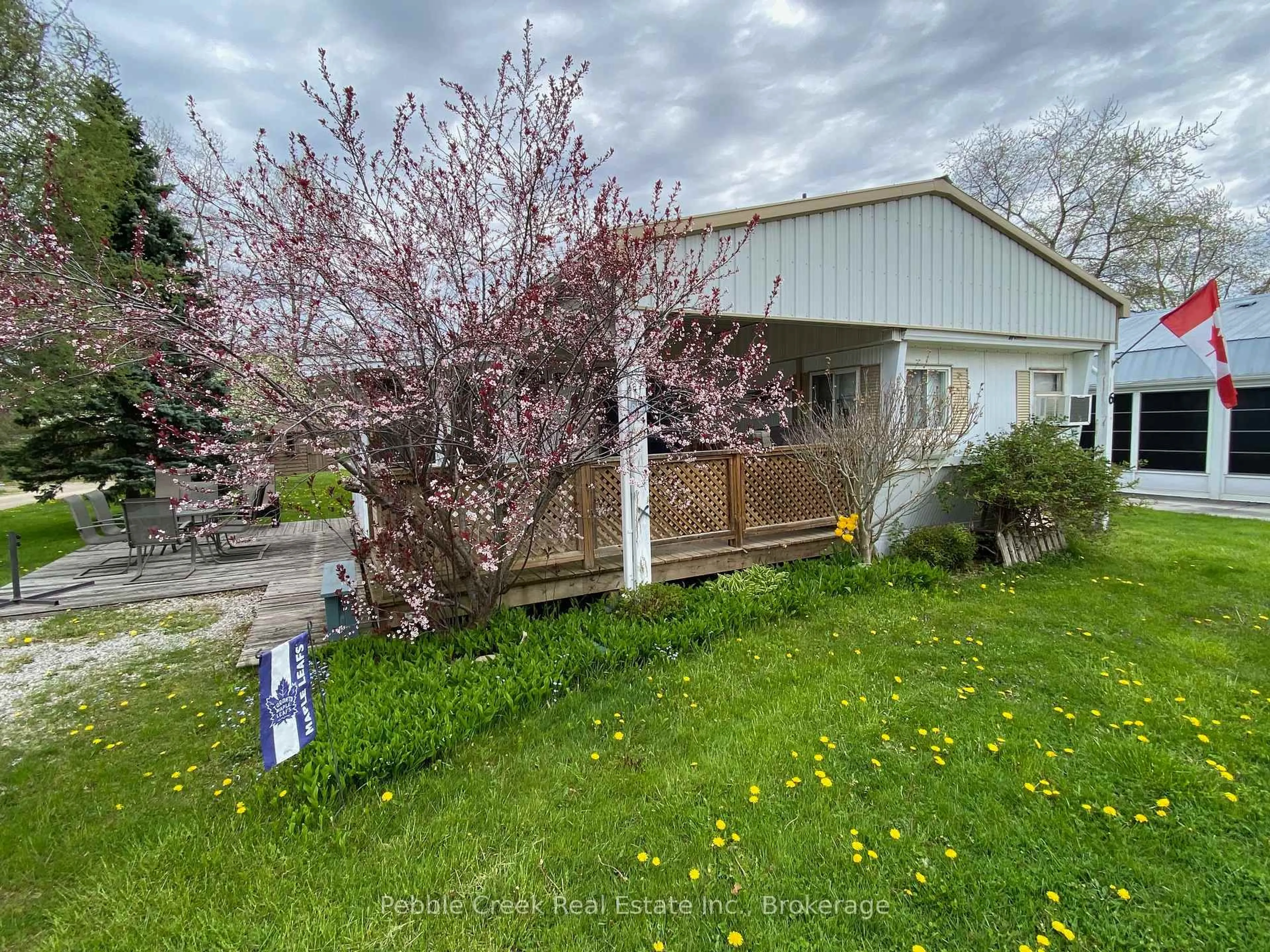 A pic from outside/outdoor area/front of a property/back of a property/a pic from drone, street for 6 Turnbull's Grove Rd, Bluewater Ontario N0M 1N0