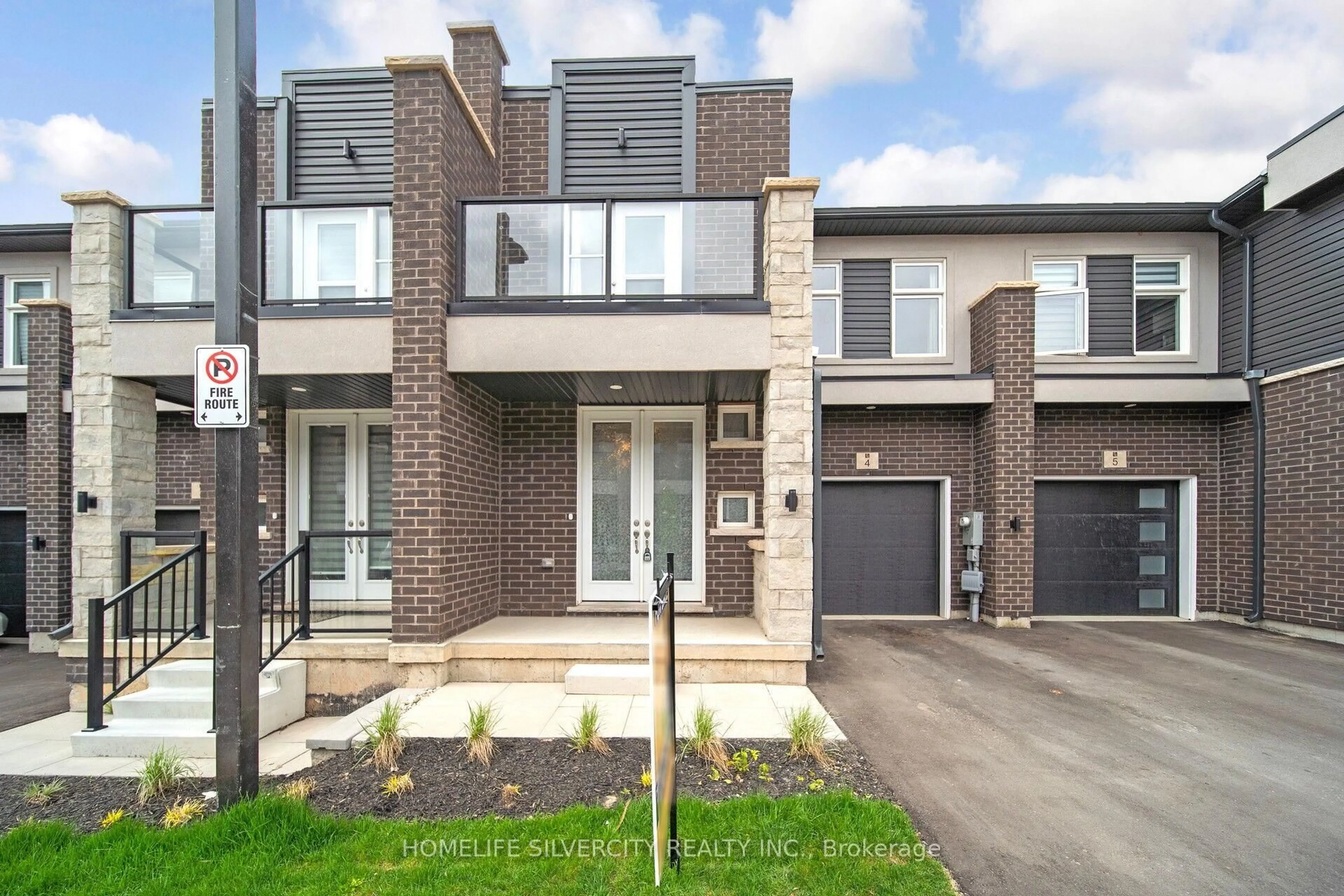 Home with brick exterior material, street for 5672 Dorchester Rd #4, Niagara Falls Ontario L2G 4Y8