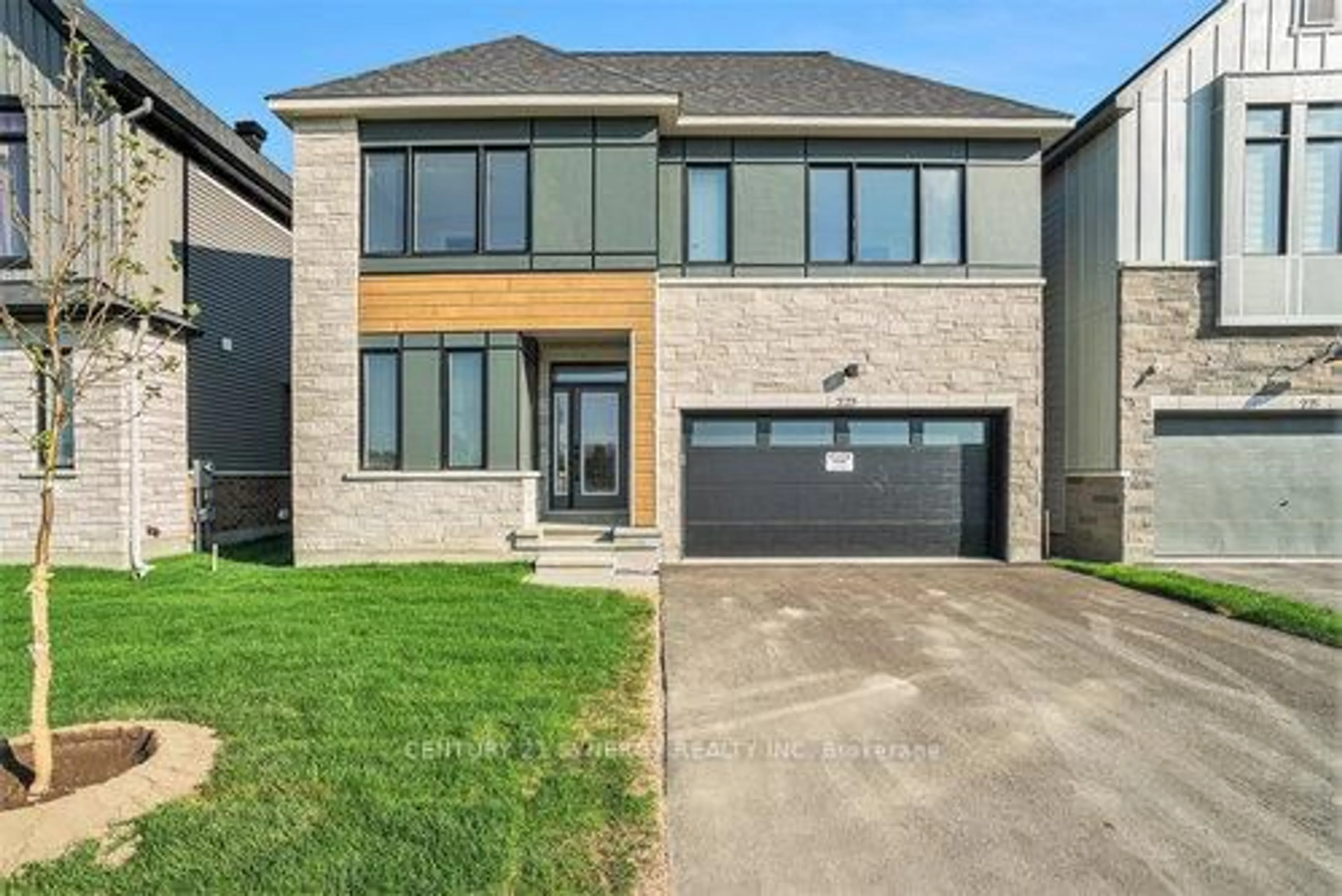 Home with brick exterior material, street for 223 Conservancy Dr, Ottawa Ontario K2J 7M5