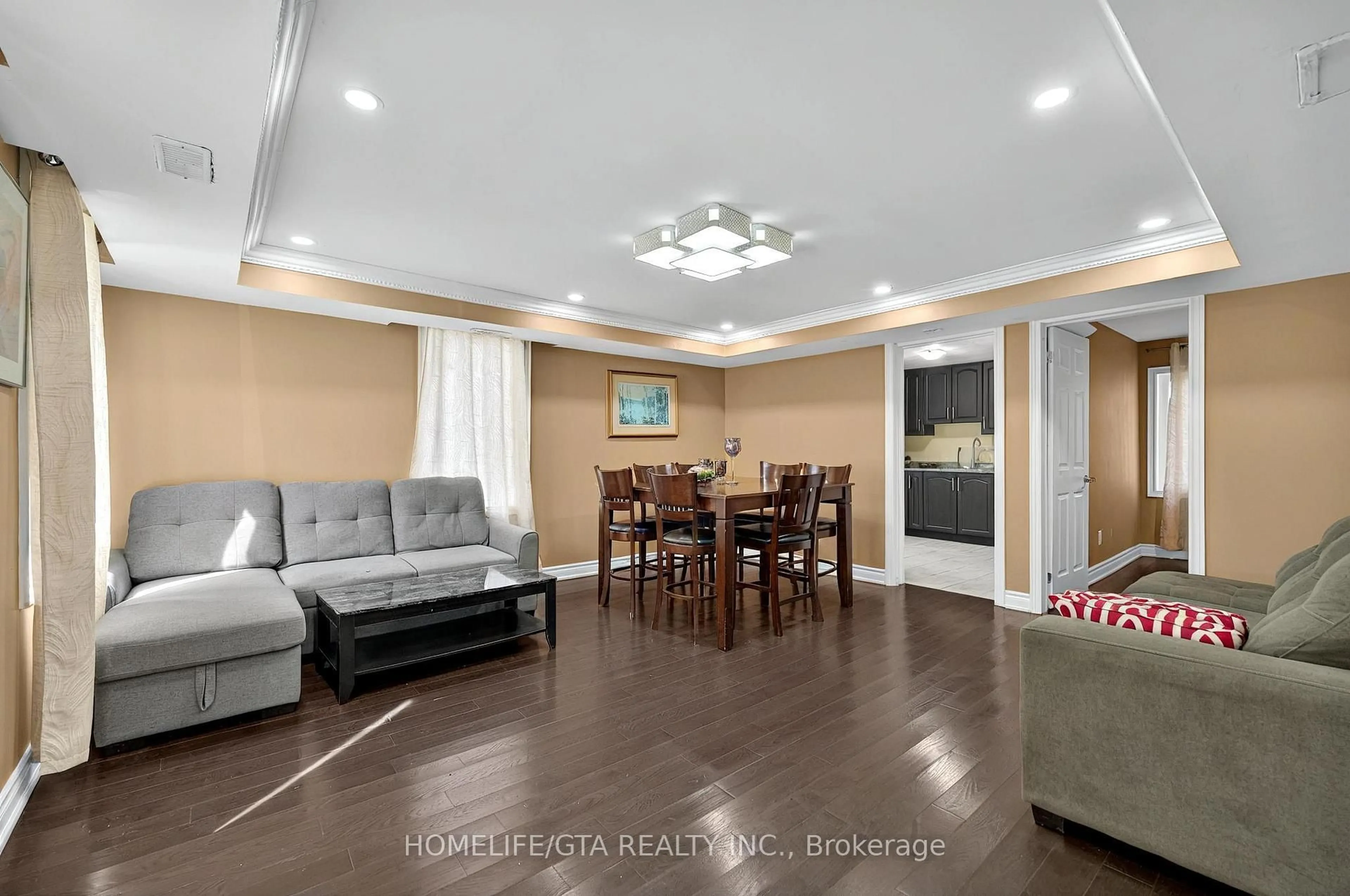 Living room with furniture, wood/laminate floor for 9334 County Road 2 N/A, Hamilton Township Ontario K9A 4J8