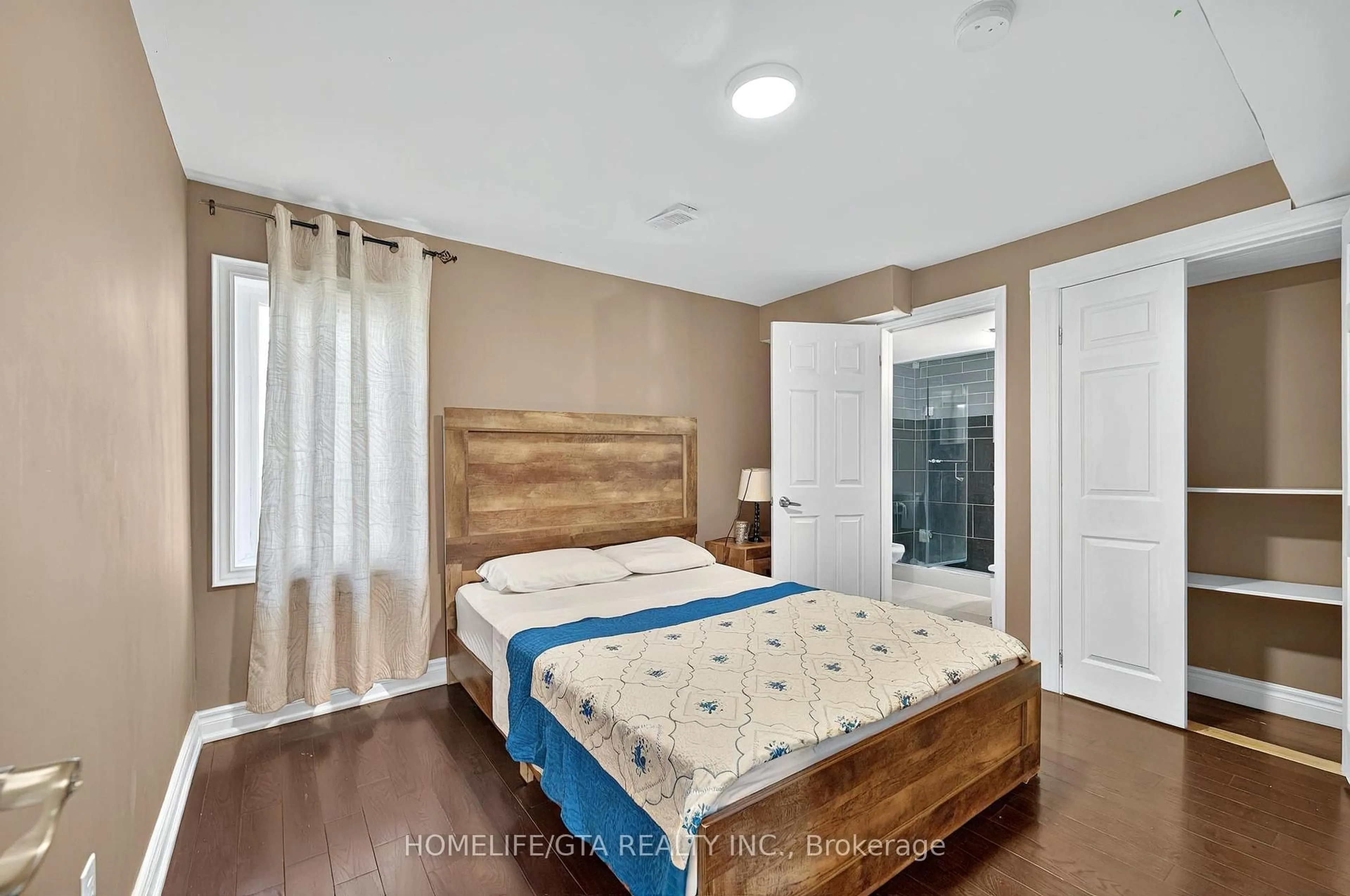 Bedroom with bed, wood/laminate floor for 9334 County Road 2 N/A, Hamilton Township Ontario K9A 4J8