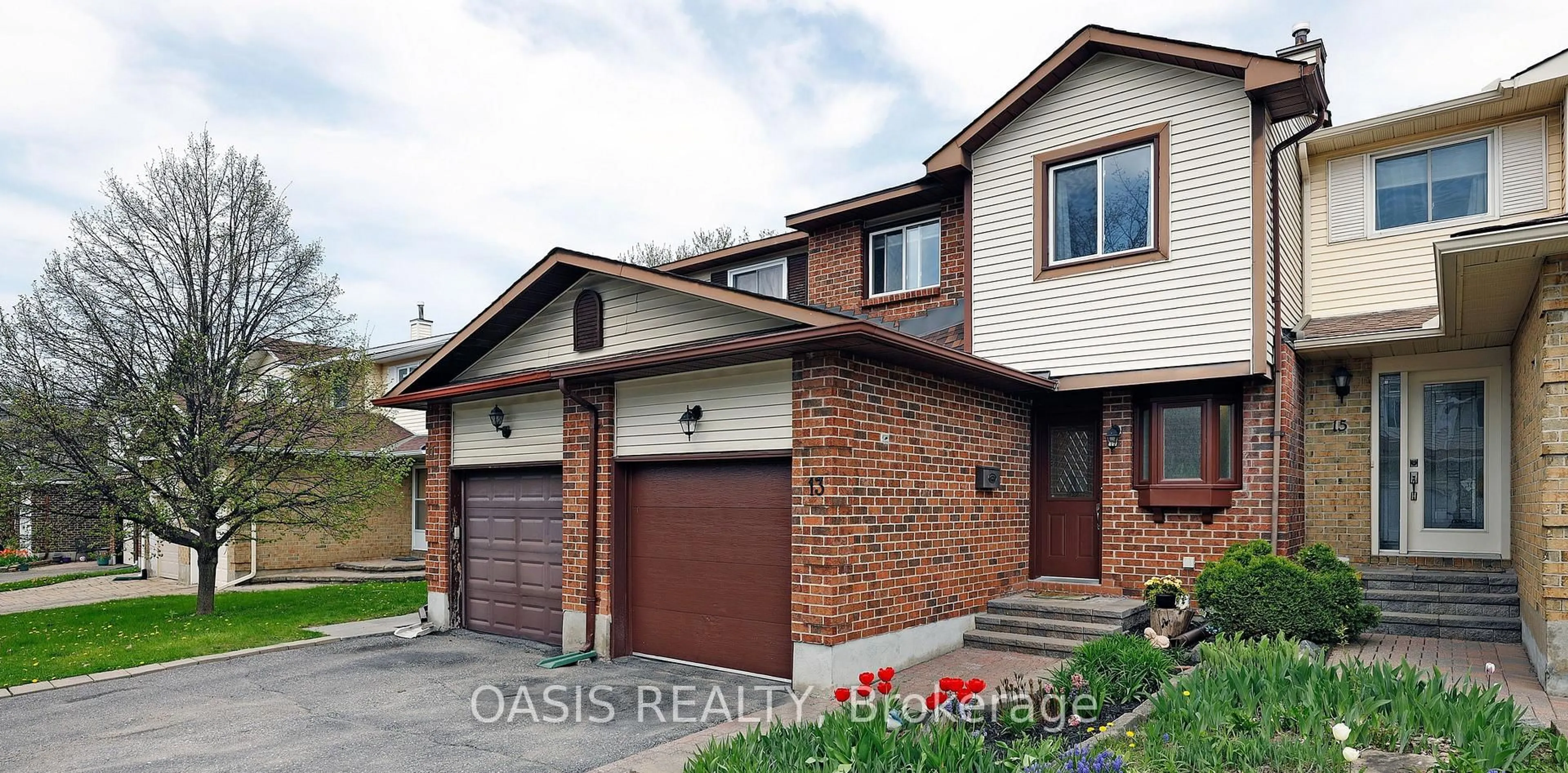 Home with brick exterior material, street for 13 Sundback Lane, Ottawa Ontario K2L 2W9