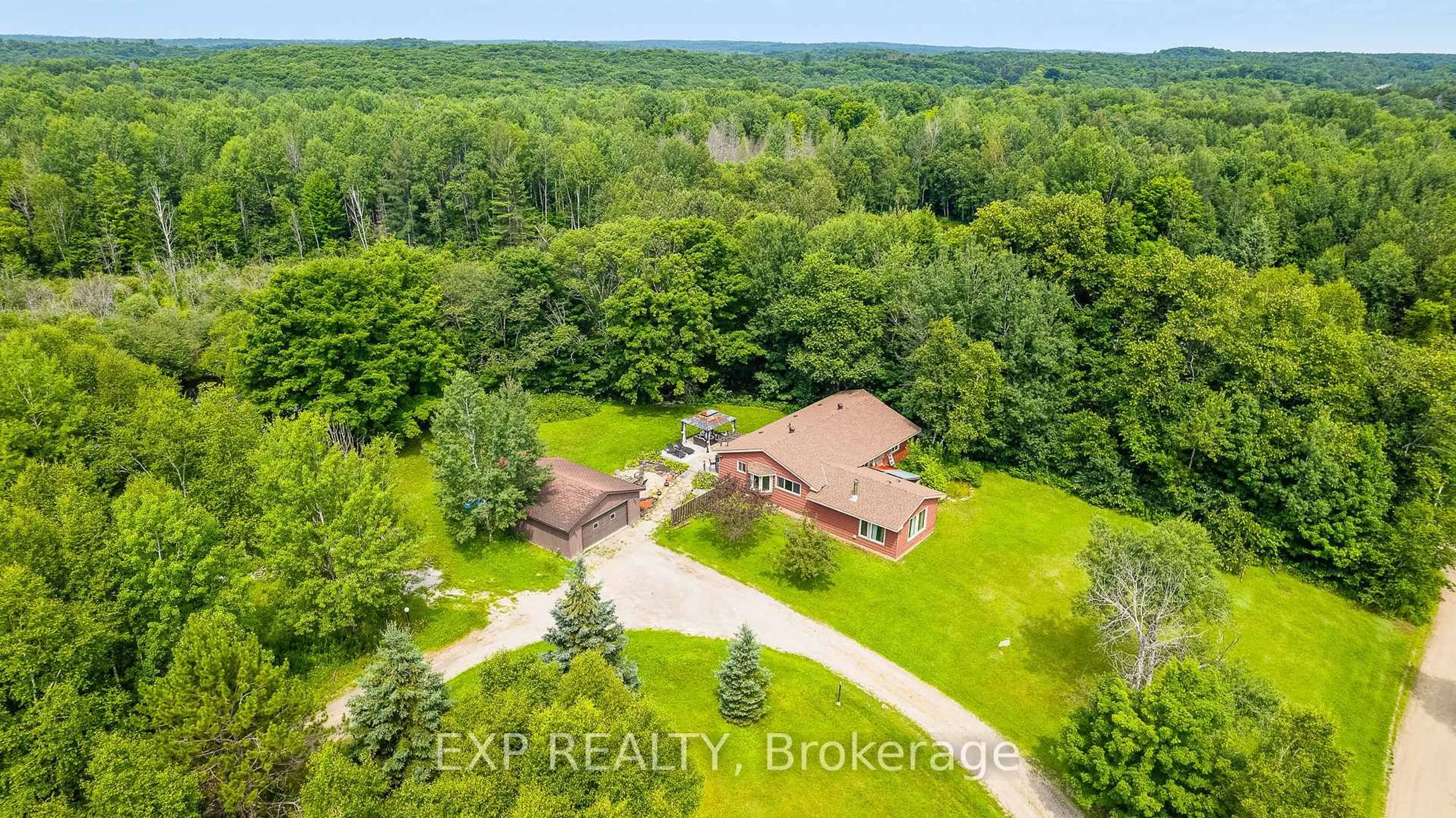 A pic from outside/outdoor area/front of a property/back of a property/a pic from drone, unknown for 1037 Kernohan Farm Tr, Minden Hills Ontario K0M 2K0