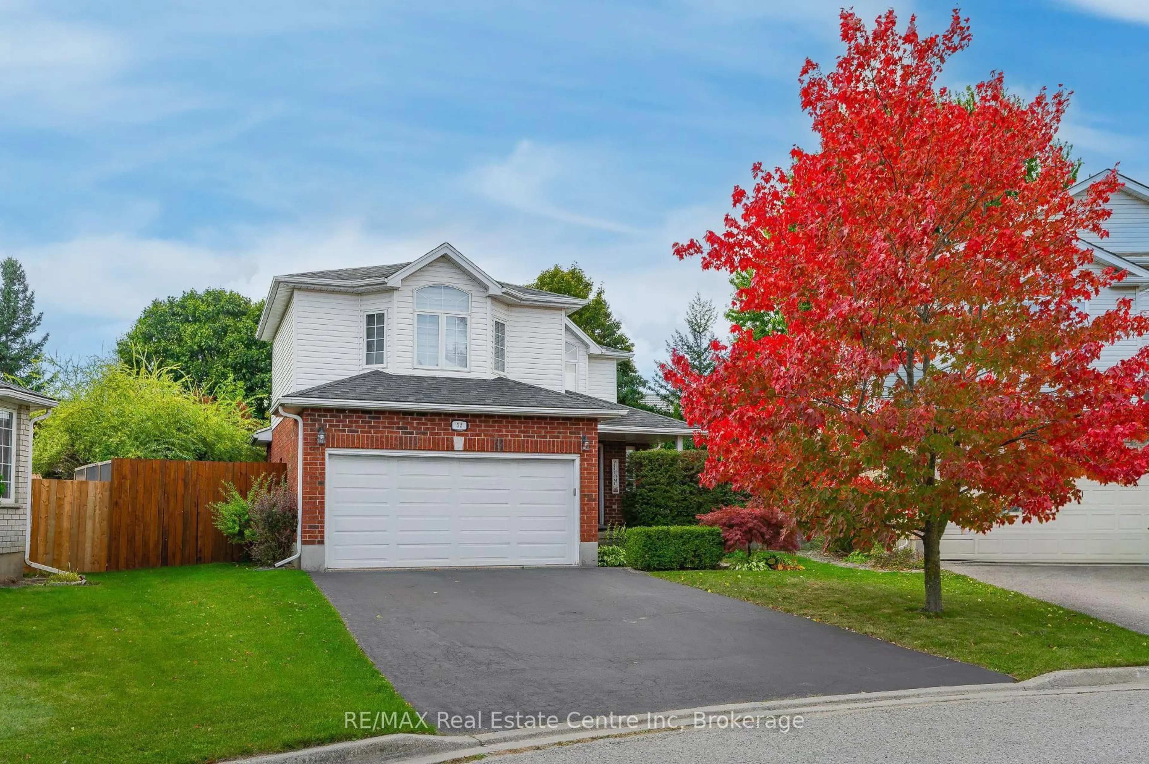 Home with vinyl exterior material, street for 52 Bond Crt, Guelph Ontario N1H 8N7