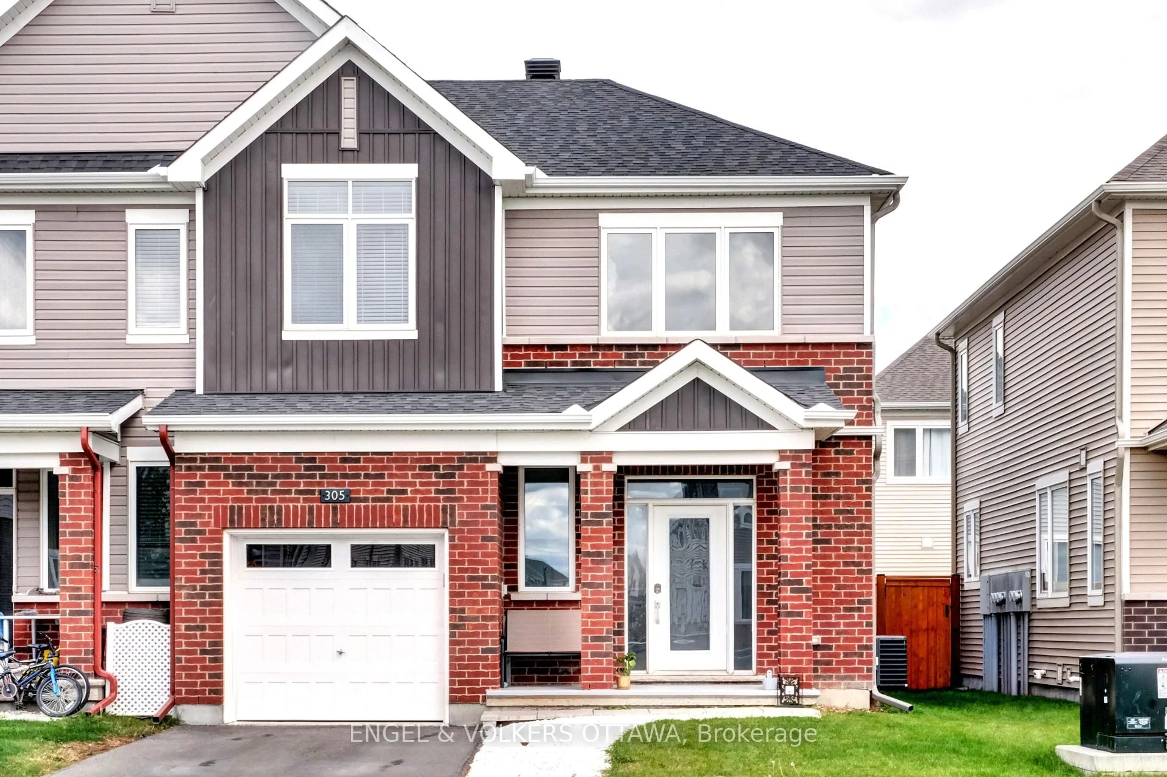 Home with brick exterior material, street for 305 Lamarche Ave, Ottawa Ontario K1C 1T1