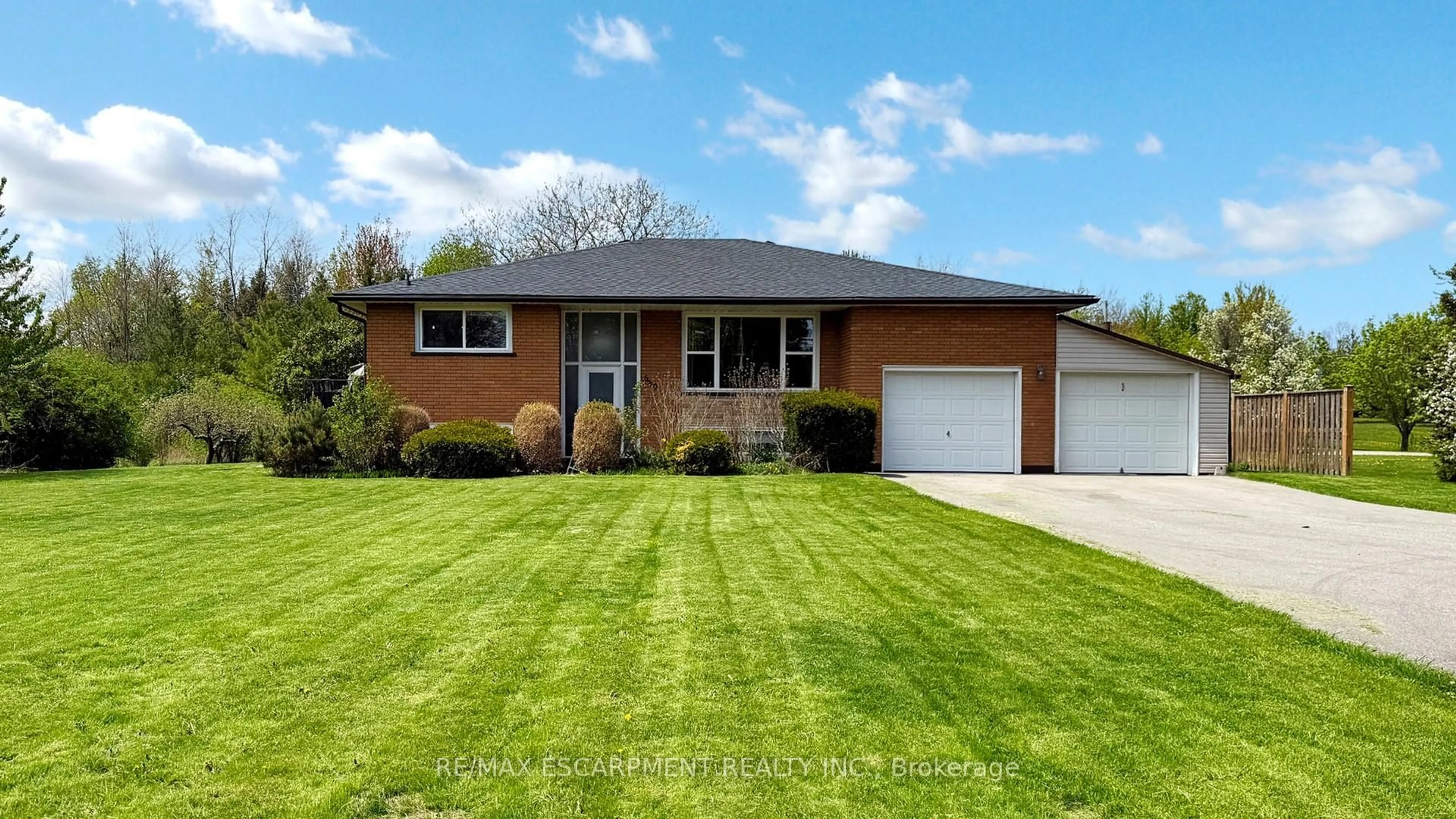 Home with brick exterior material, street for 630 TRINITY CHURCH Rd, Hamilton Ontario L0R 1P0