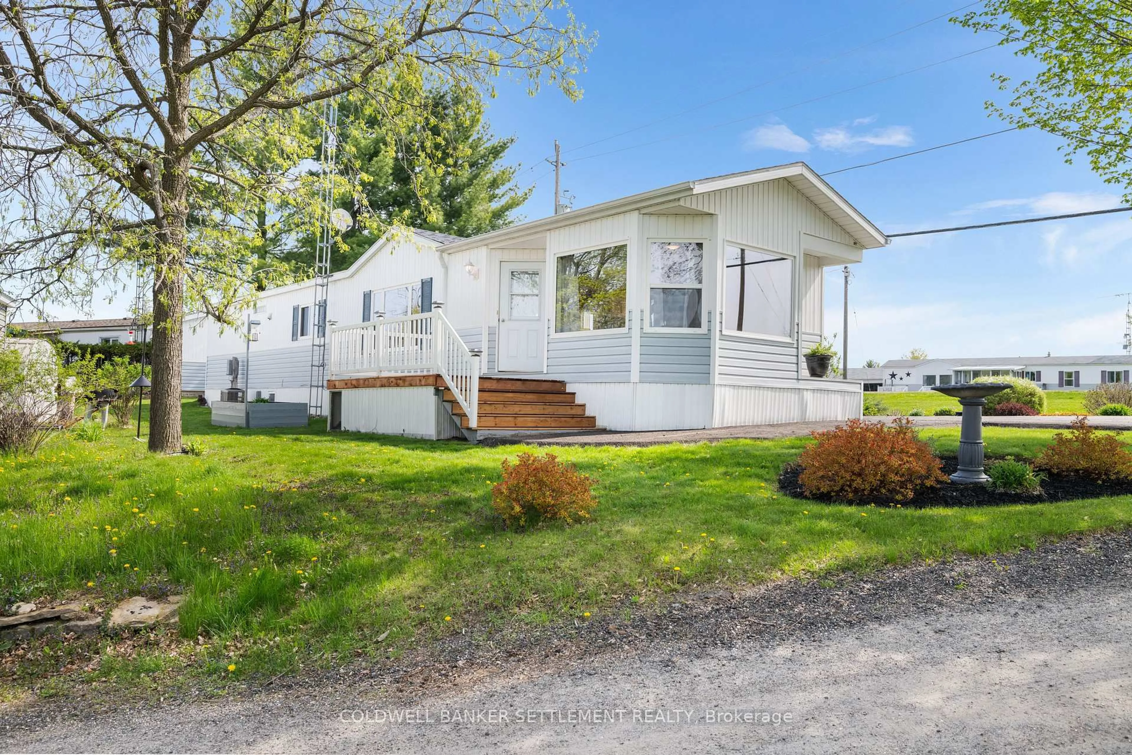 Home with vinyl exterior material, street for 304 Acacia Rd, Perth Ontario K7H 3C8