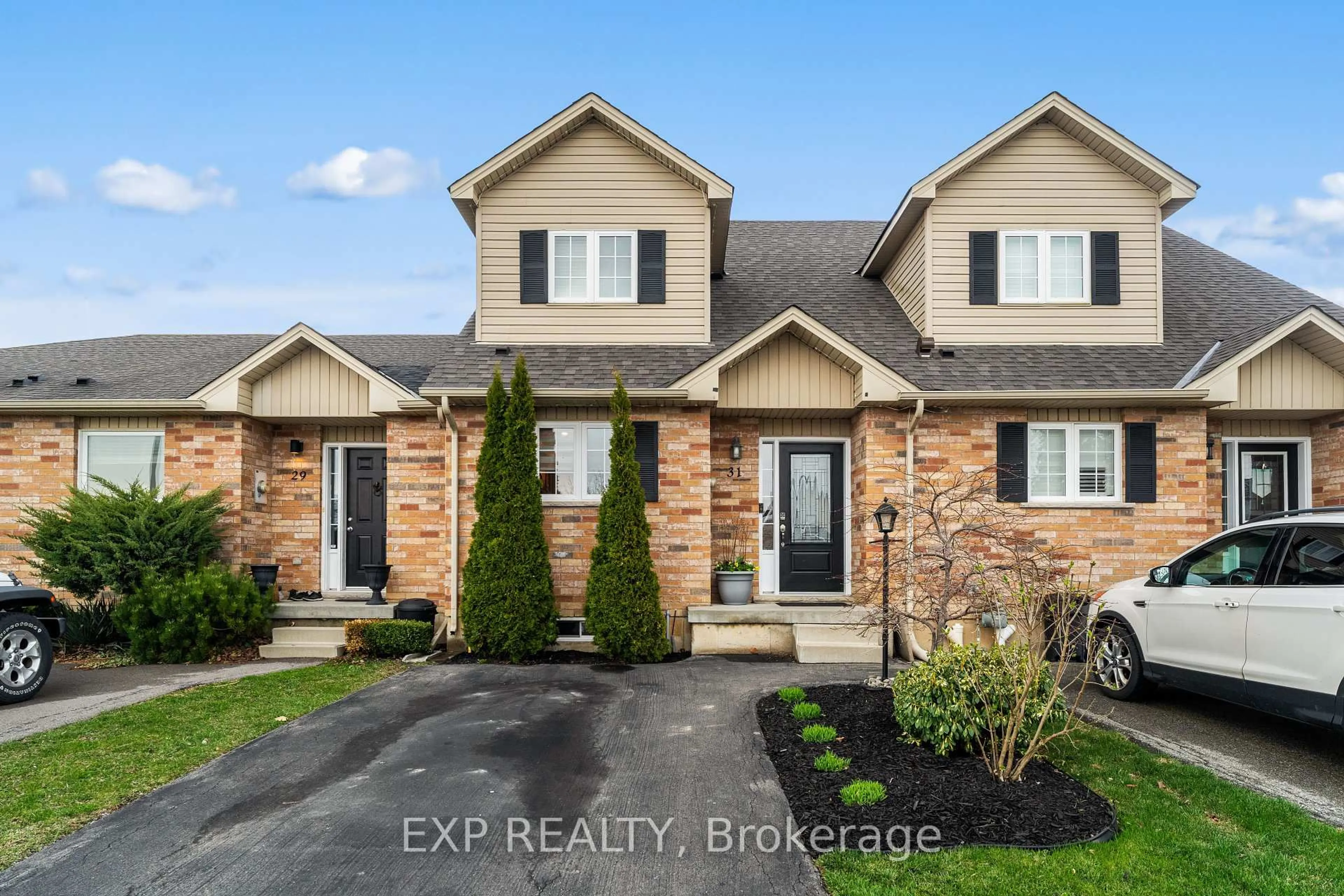 Home with brick exterior material, street for 31 Powell Lane, Haldimand Ontario N0A 1E0
