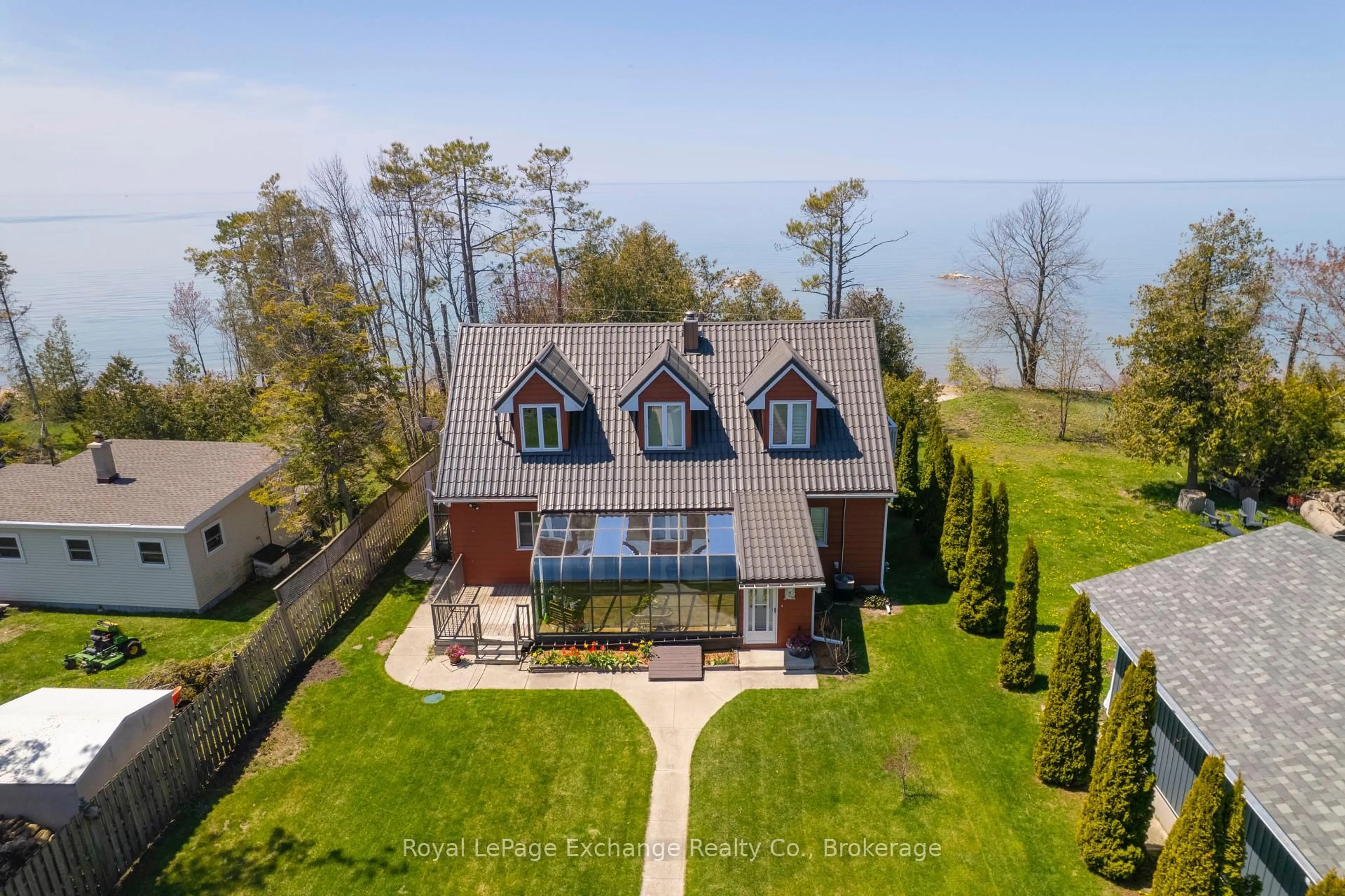A pic from outside/outdoor area/front of a property/back of a property/a pic from drone, water/lake/river/ocean view for 185 Huron Rd, Huron-Kinloss Ontario N2Z 2X3