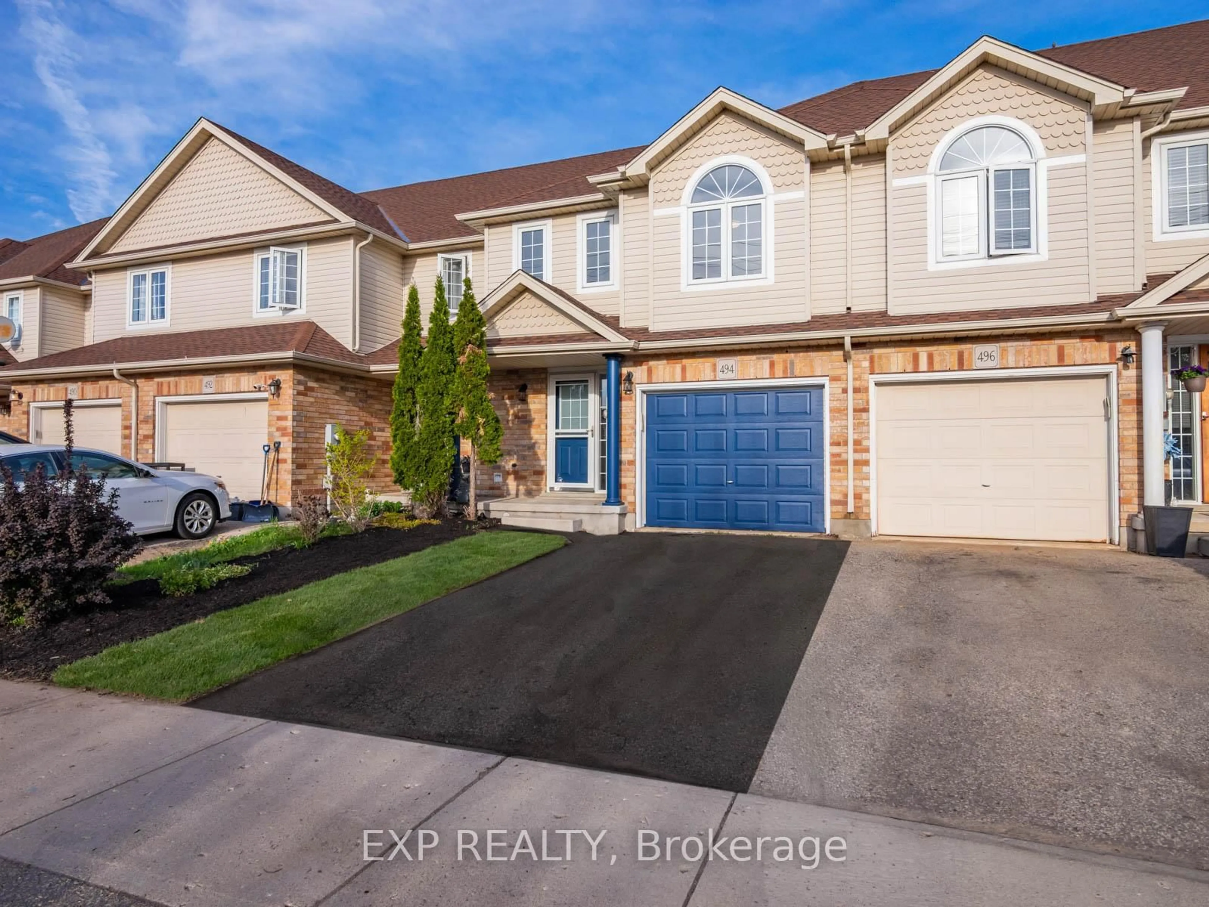 Home with vinyl exterior material, street for 494 Doon Dr, Kitchener Ontario N2P 2Z1