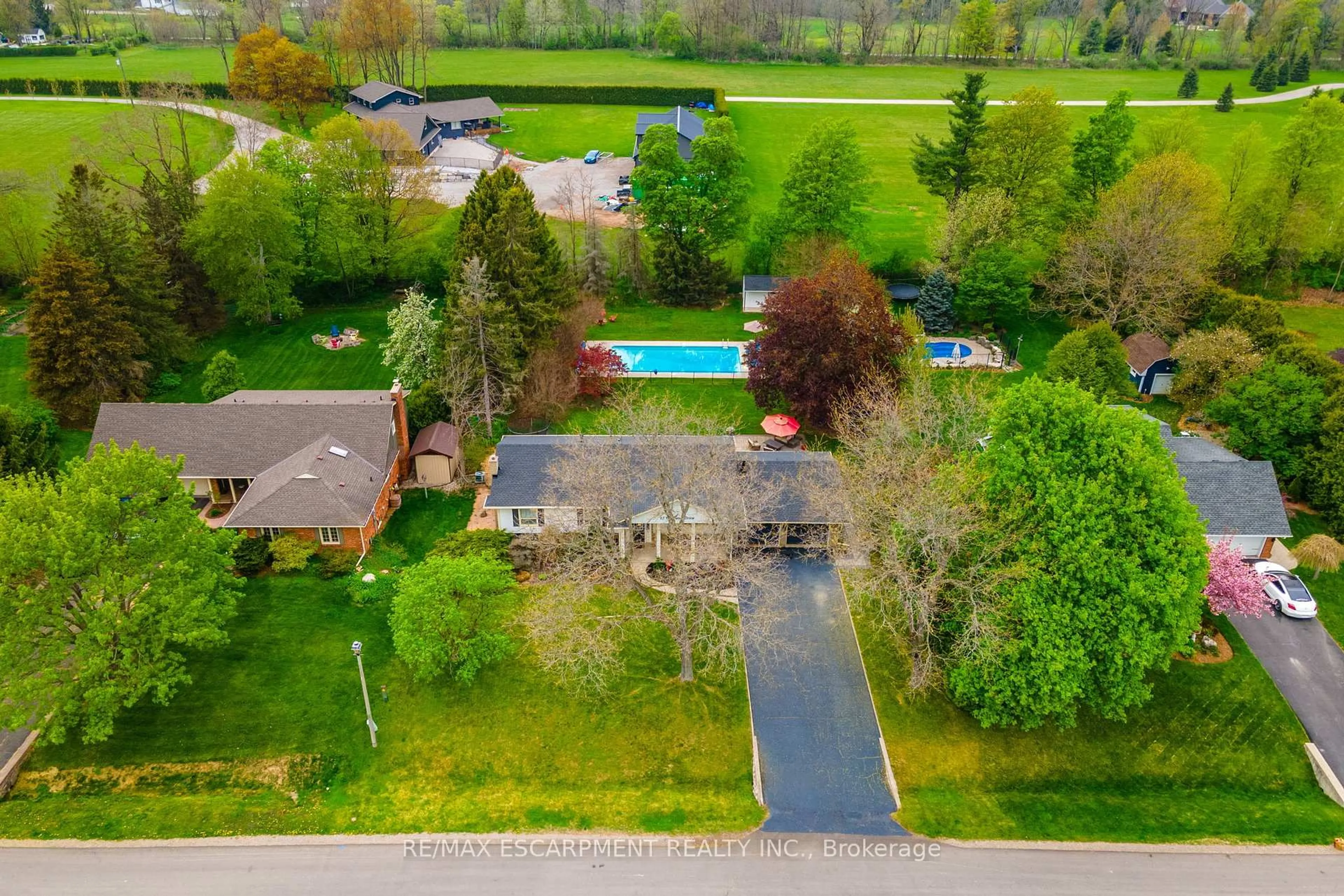 A pic from outside/outdoor area/front of a property/back of a property/a pic from drone, water/lake/river/ocean view for 13 Woodend Dr, Hamilton Ontario L0R 1H2