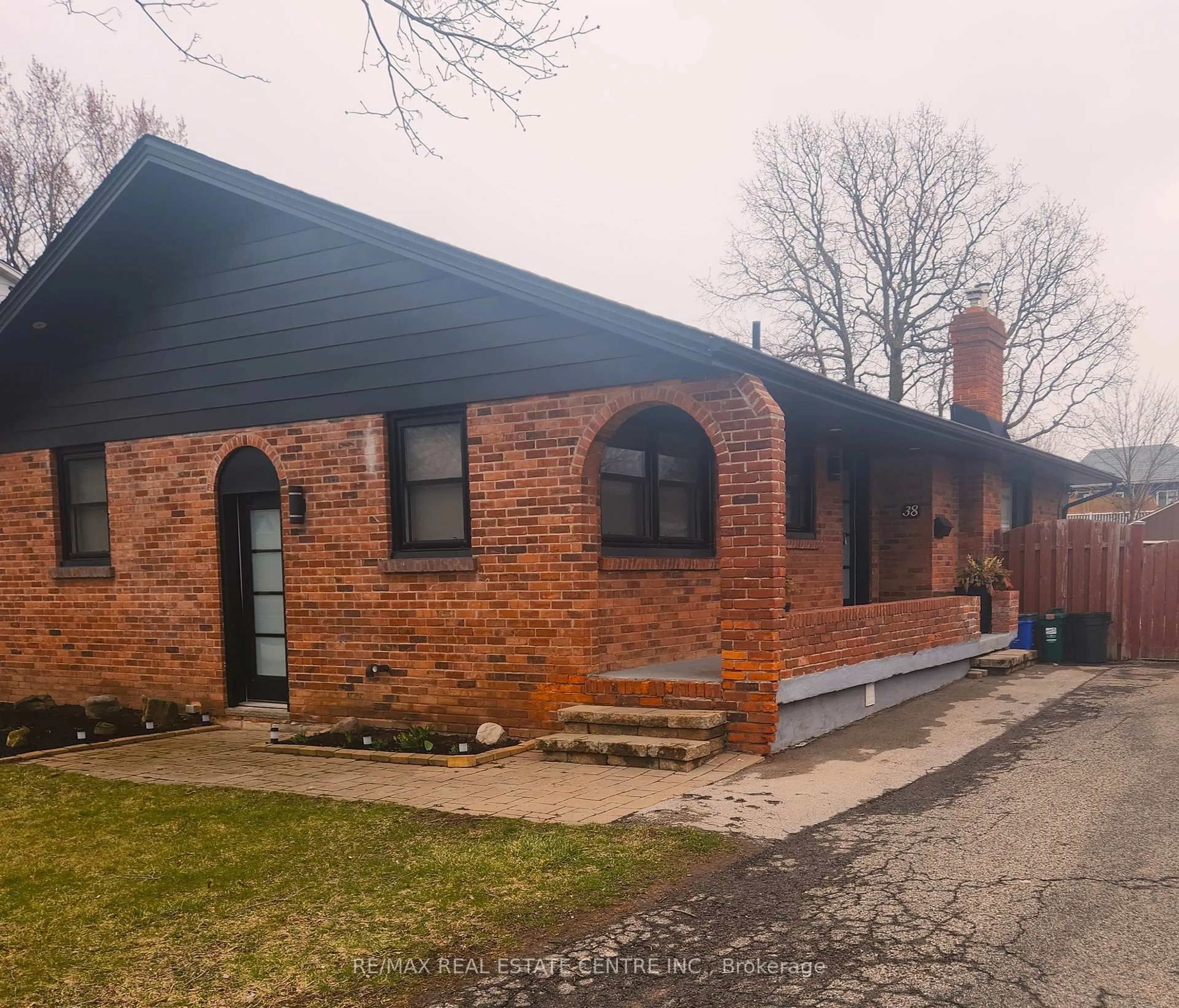 Home with brick exterior material, street for 38 Stewart St, Grimsby Ontario L3M 3M8