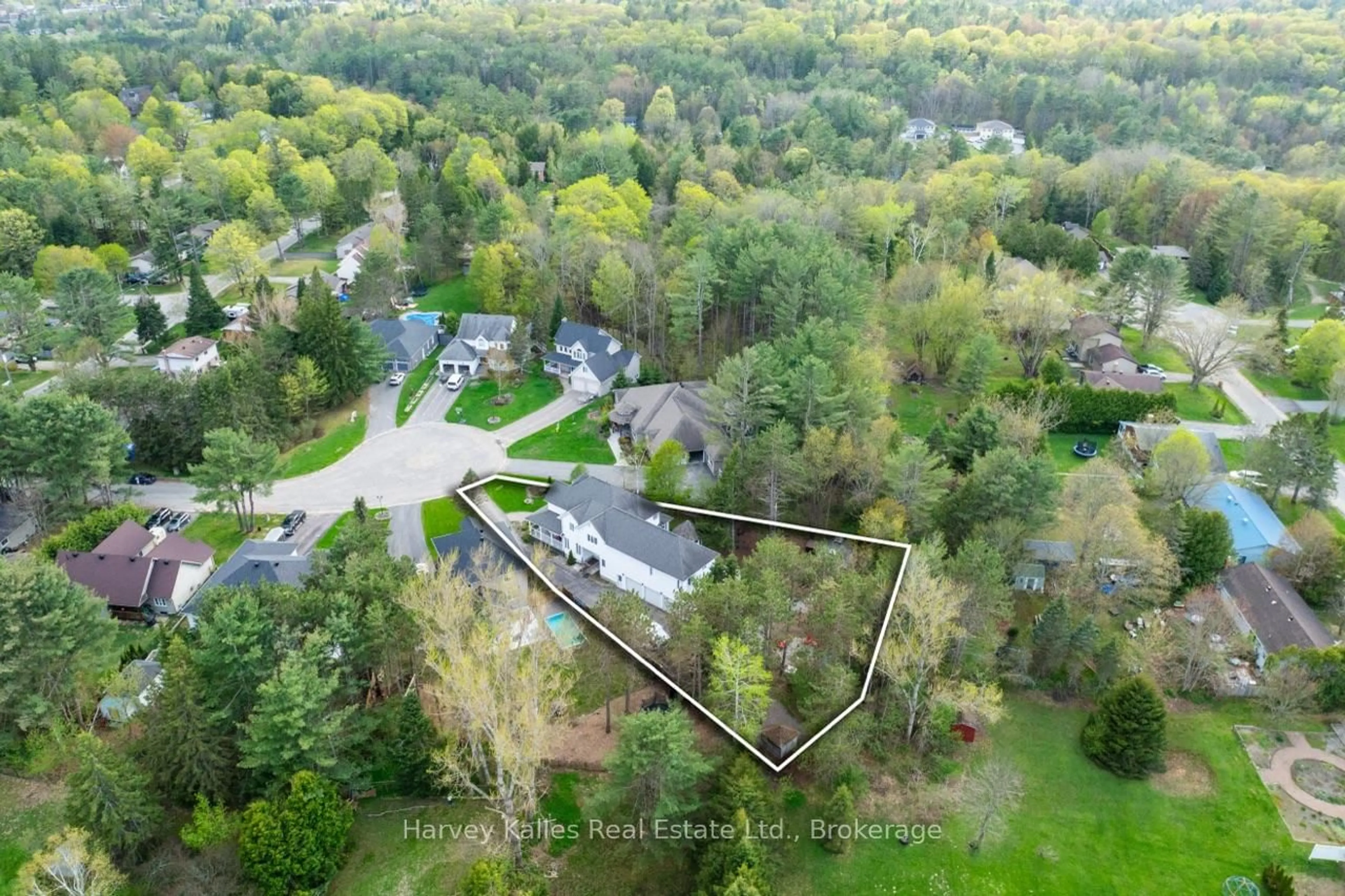 A pic from outside/outdoor area/front of a property/back of a property/a pic from drone, forest/trees view for 9 Melane Crt, Bracebridge Ontario P1L 1X7